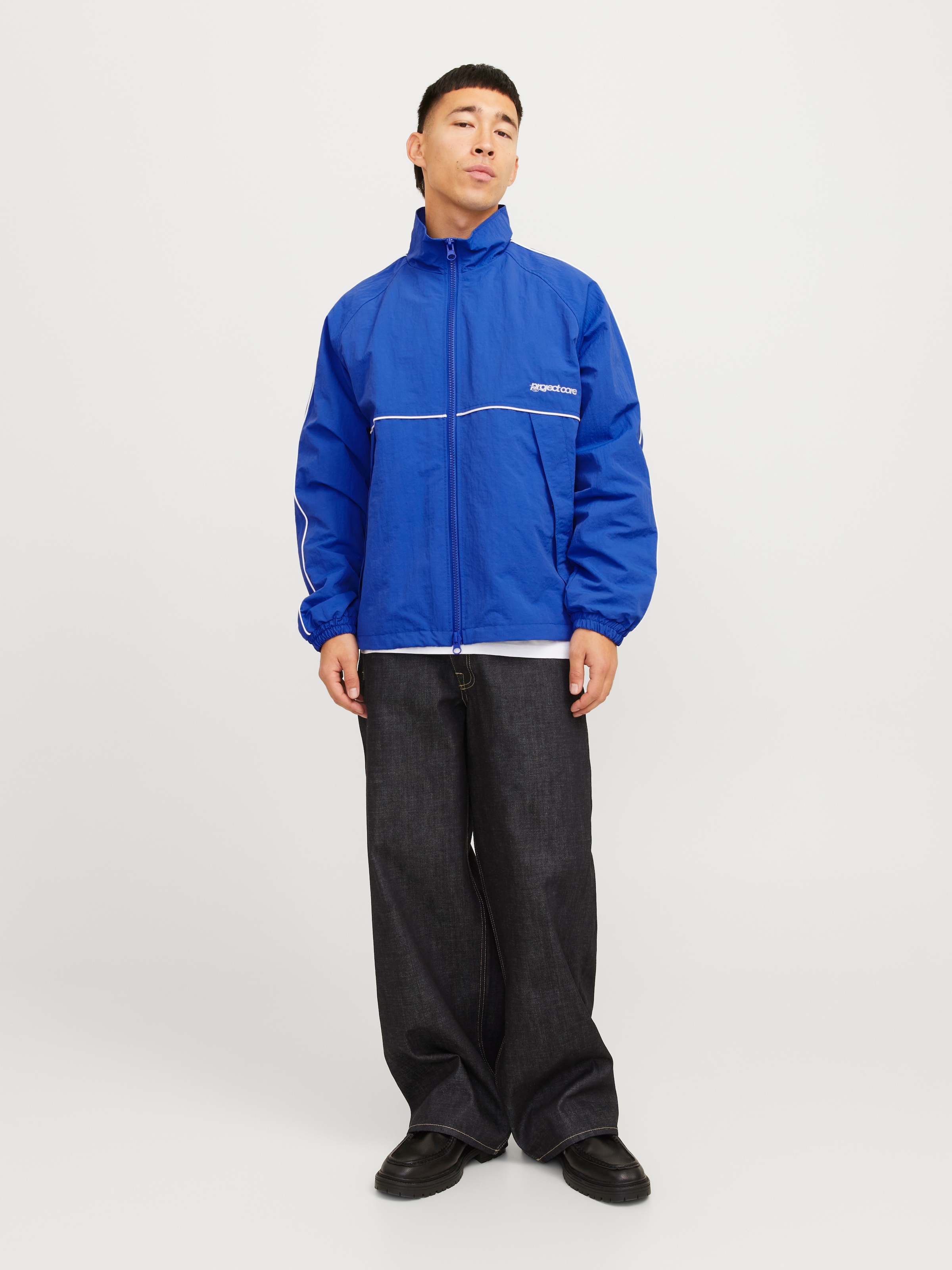 Jack & Jones Outdoorjacke »JCOUNION TRACK JACKET SN«, ohne Kapuze, Mit stylischem Print