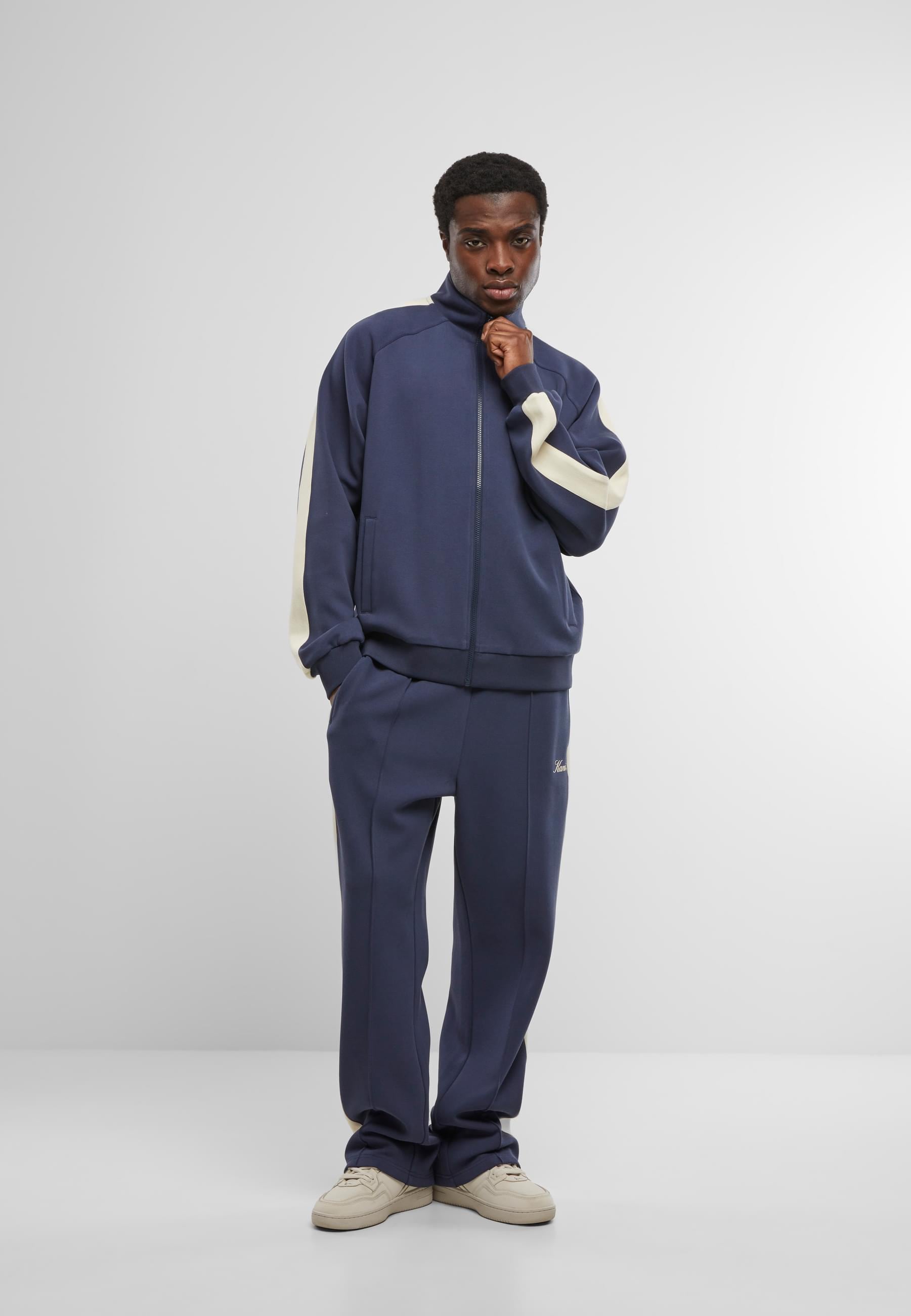 Karl Kani Trainingsjacke »Karl Kani Kani Sidestripe Trackjacket« 1 Stk. tlg. ohne Kapuze