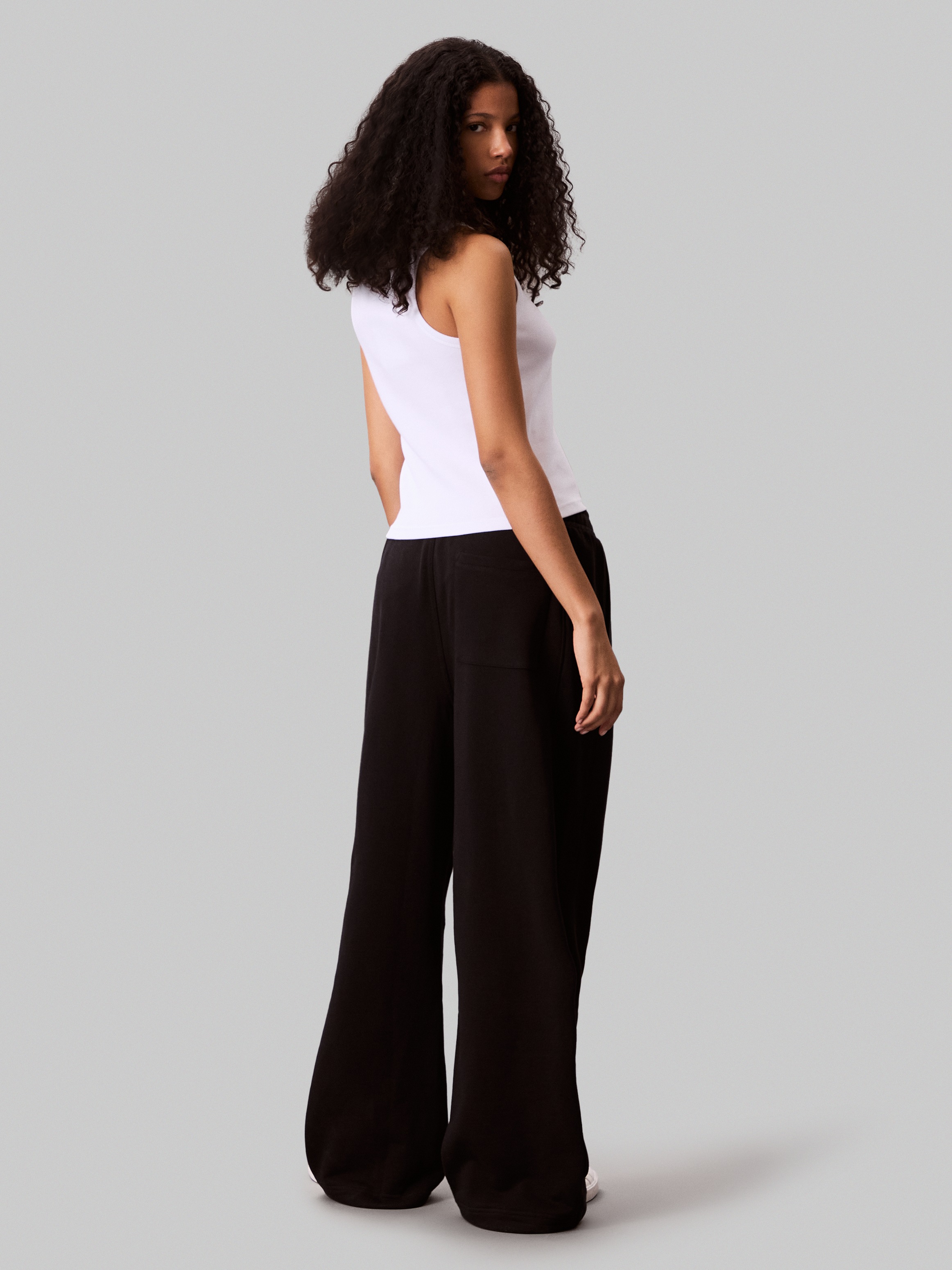 Calvin Klein Jeans Sweathose »A- FRENCH TERRY BADGE LOGO PANT«, mit weitem Bein