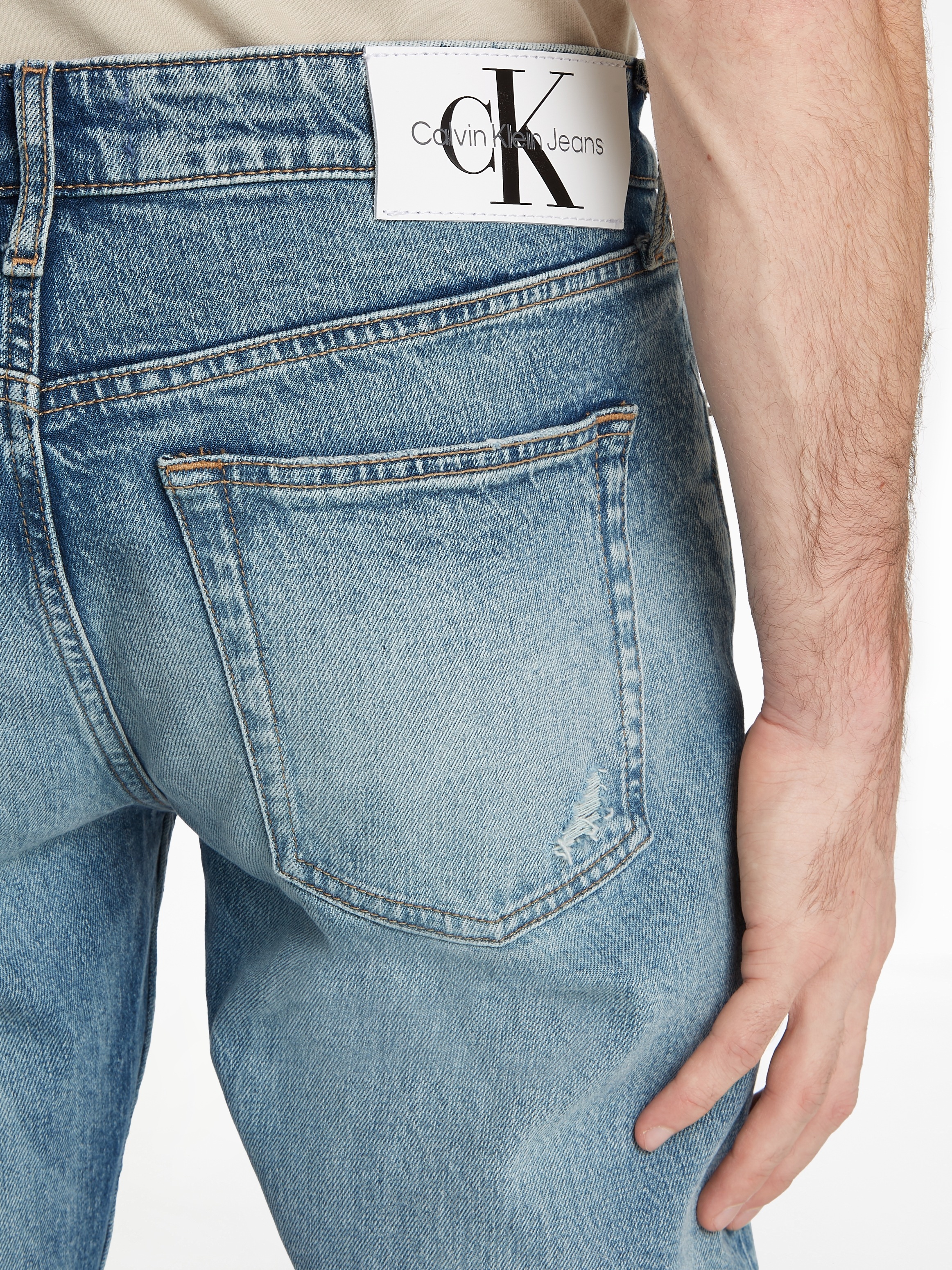 Calvin Klein Jeans Tapered-fit-Jeans »SLIM TAPER«, mit Leder-Badge