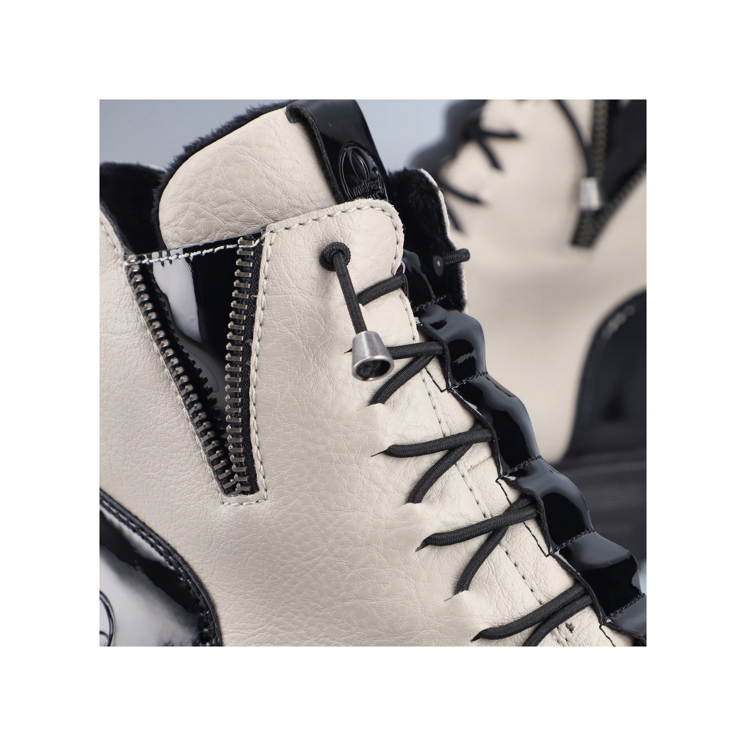 Rieker Schnürboots  Stiefelette mit Gummizug-Schnürung und Lack-Details