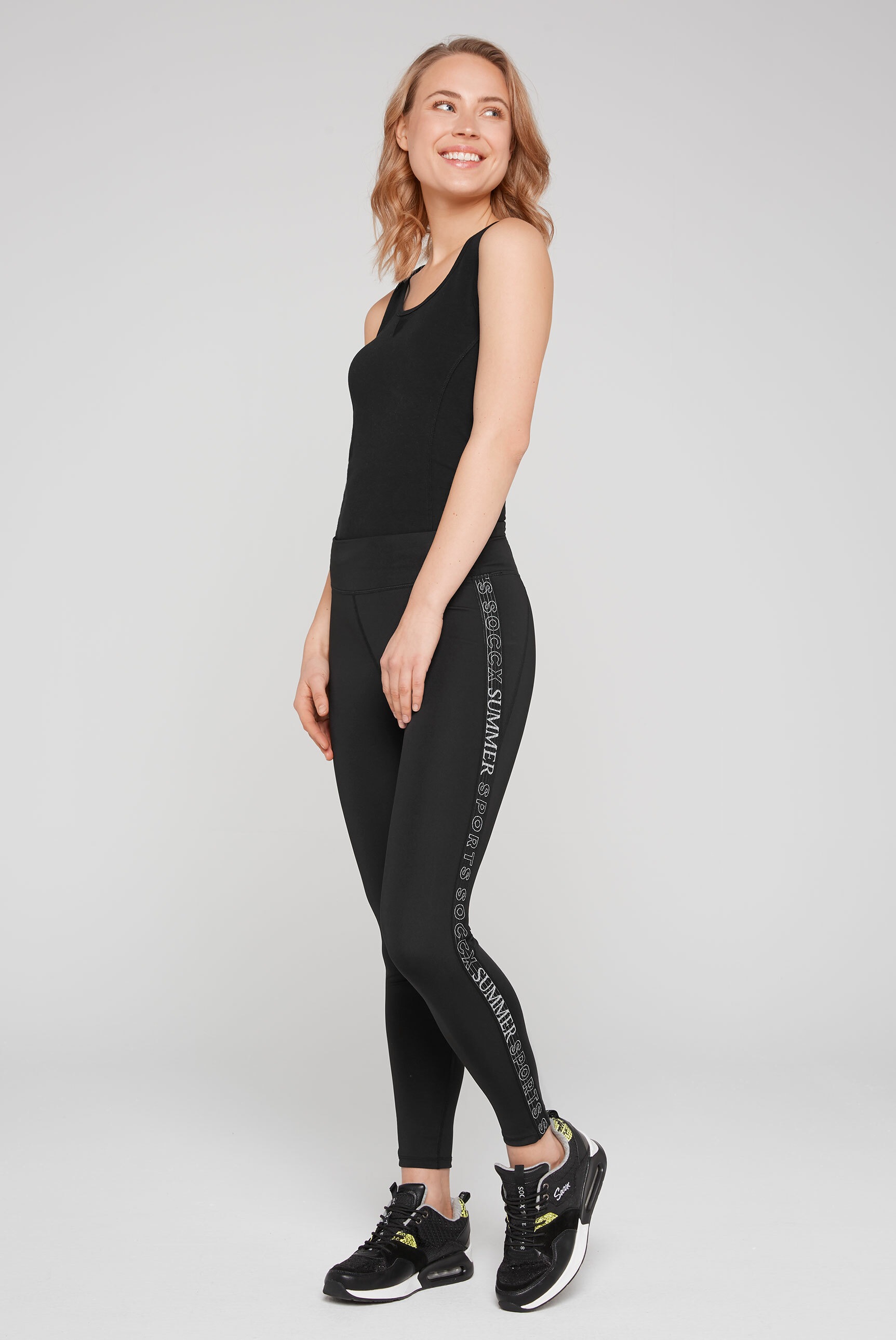 SOCCX Leggings, mit kleiner Reißverschlusstasche hinten am Bund