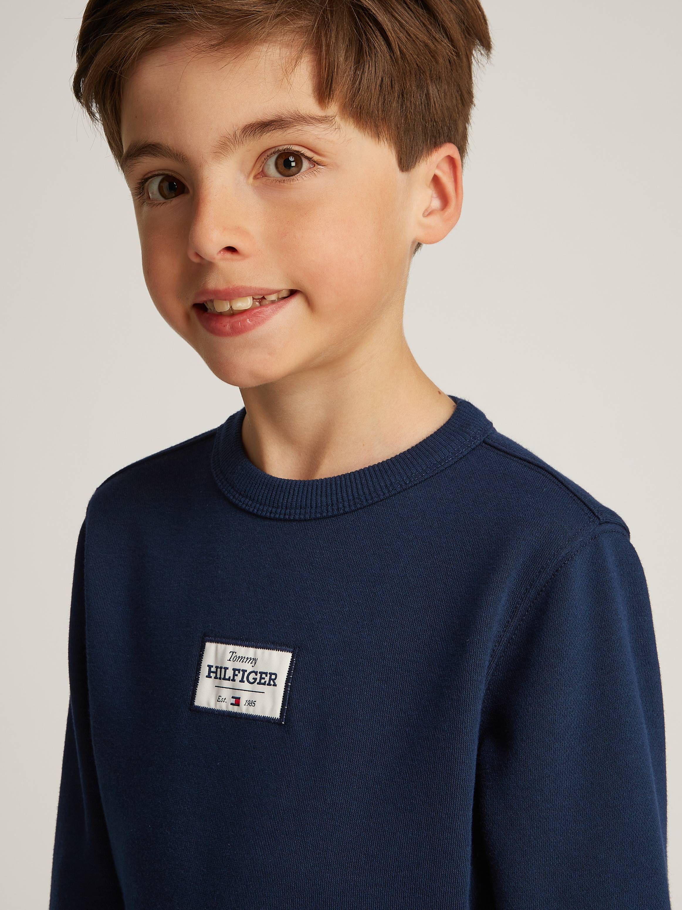 Tommy Hilfiger Sweatshirt »MONOTYPE 1985 LABEL REG SWEATSH«, mit Logo-Patch