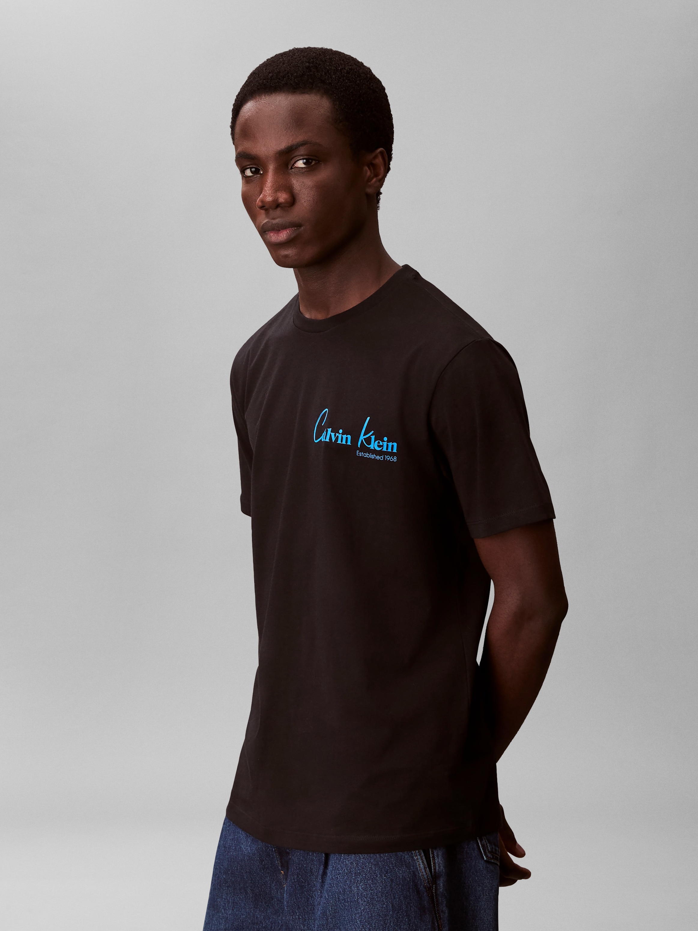 Calvin Klein Jeans T-Shirt »JEANS GRAPHICS« Regular fit mit Markenprint