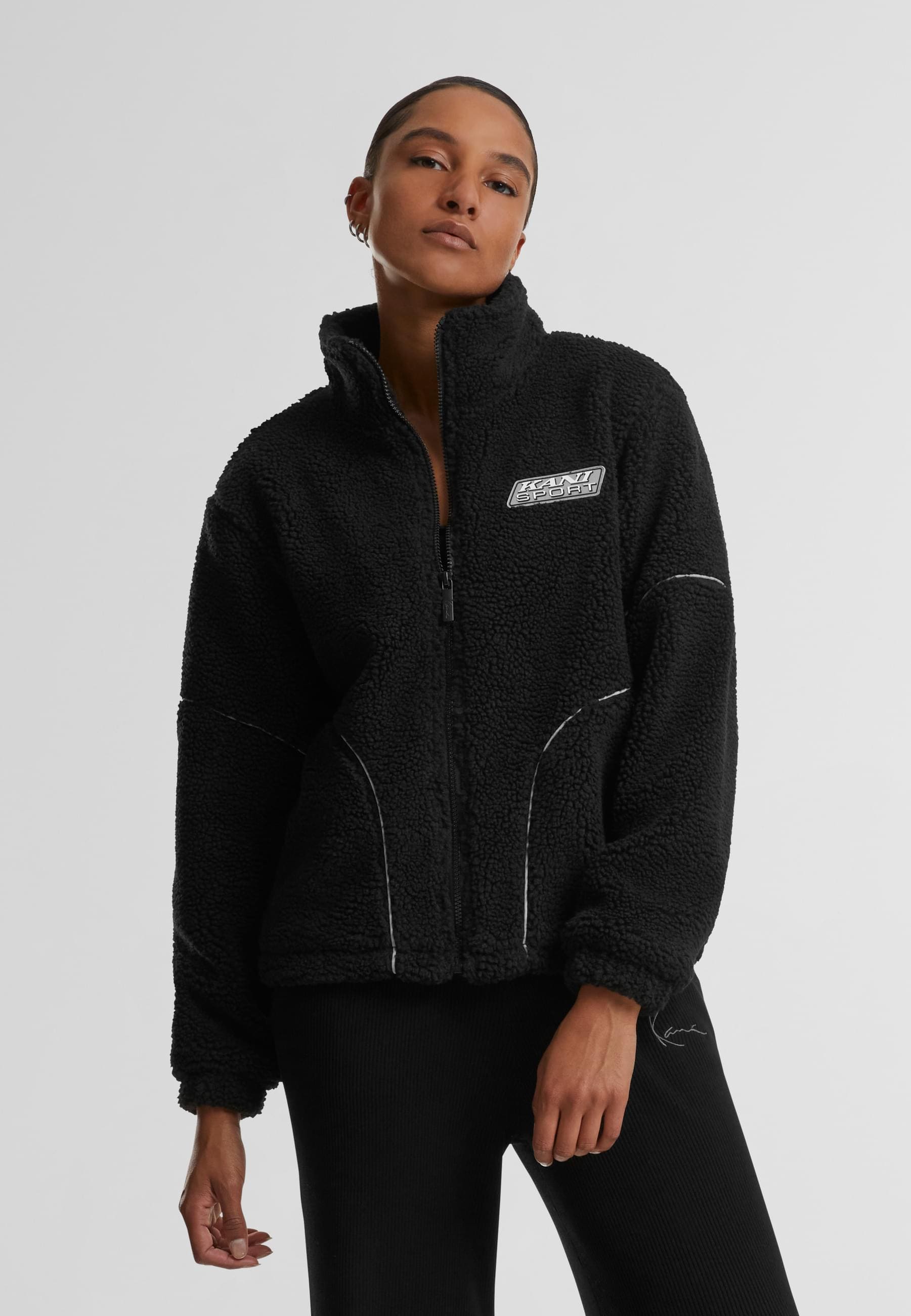 Karl Kani Trainingsjacke »Karl Kani Karl Kani Sport Patch Teddy Block Trackjacket« 1 Stk. tlg. ohne Kapuze