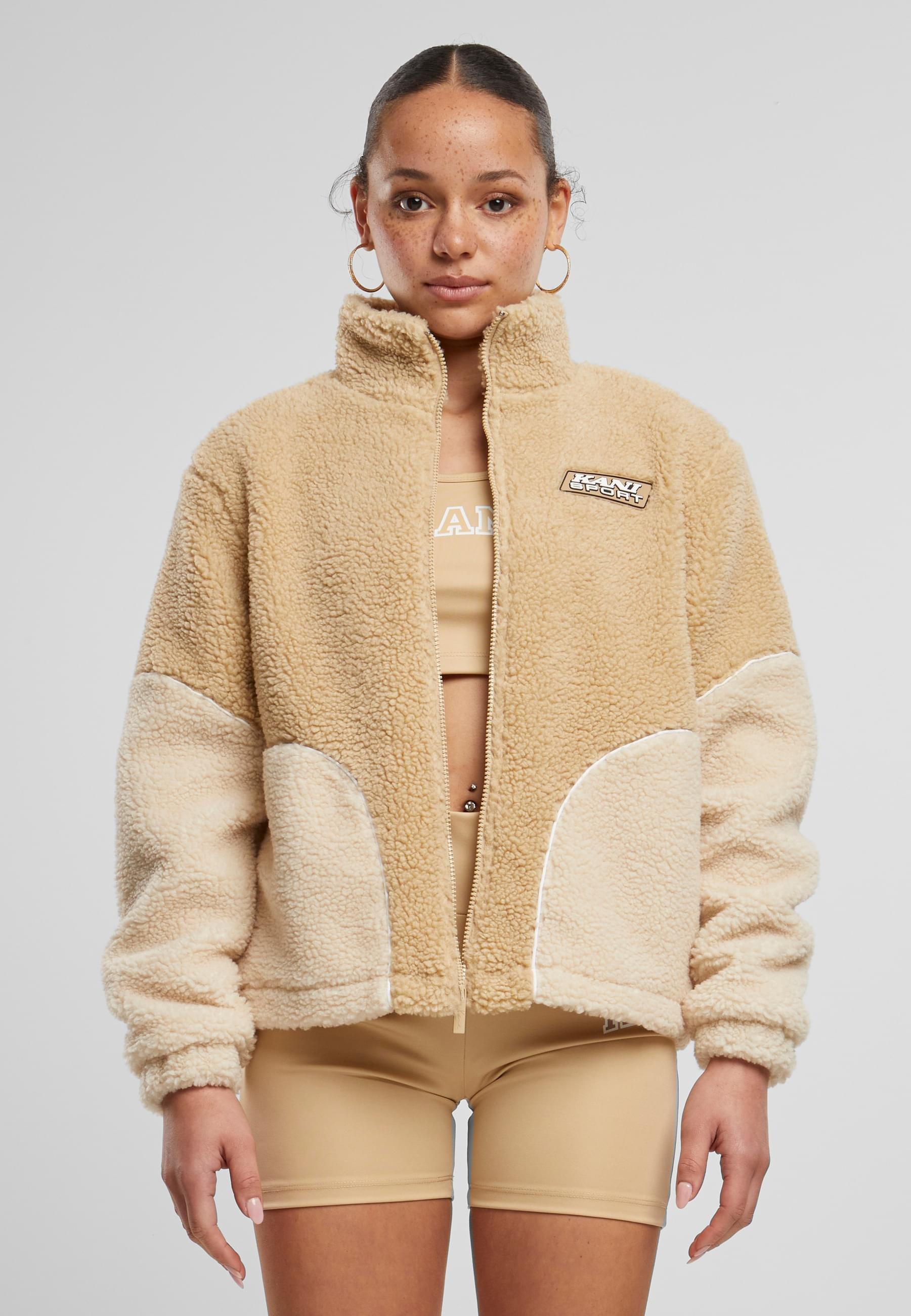 Karl Kani Trainingsjacke »Karl Kani Karl Kani Sport Patch Teddy Block Trackjacket« 1 Stk. tlg. ohne Kapuze