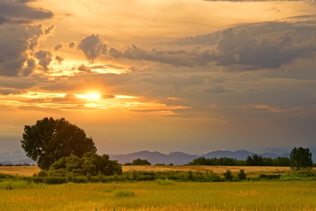 Papermoon Fototapete »Sonnenuntergangslandschaft« günstig online kaufen