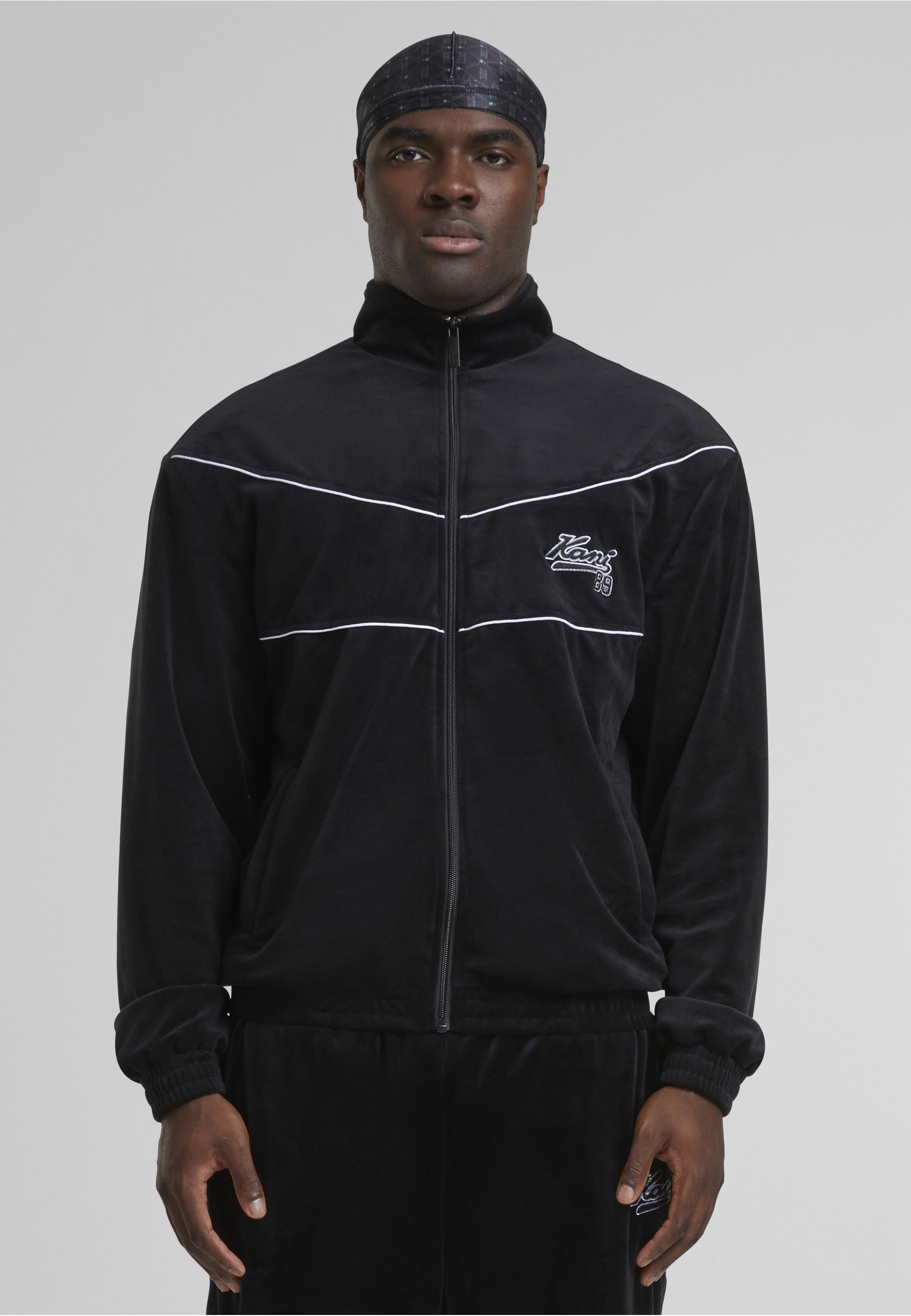 Karl Kani Trainingsjacke »Karl Kani Kani Varsity Velours Trackjacket« 1 Stk. tlg. ohne Kapuze
