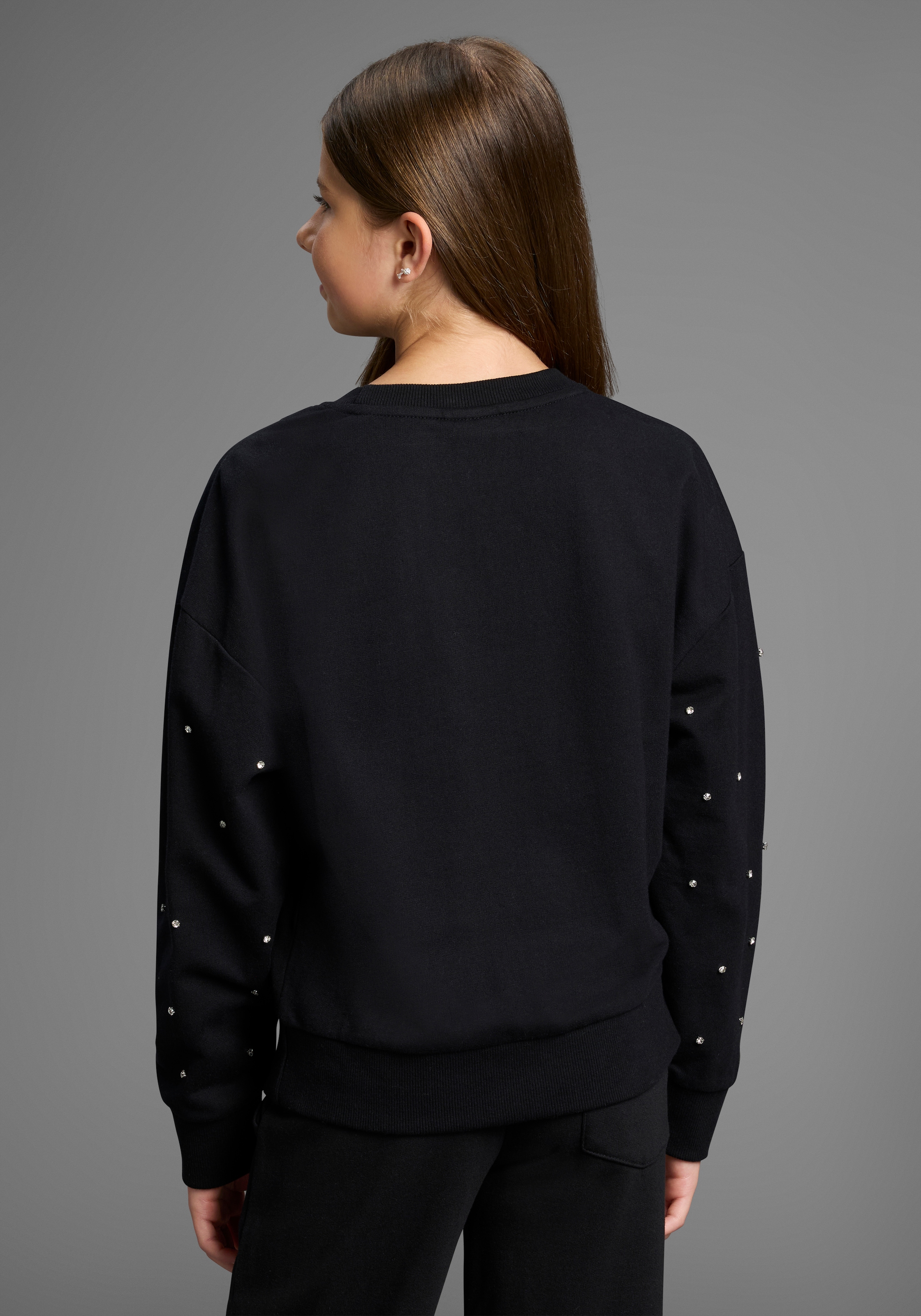 Bruno Banani Sweatshirt »Kurzes Sweatshirt mit Strass-Steinen«, Für TEENS. Trendiges Shirt mit Strass-Steinen

