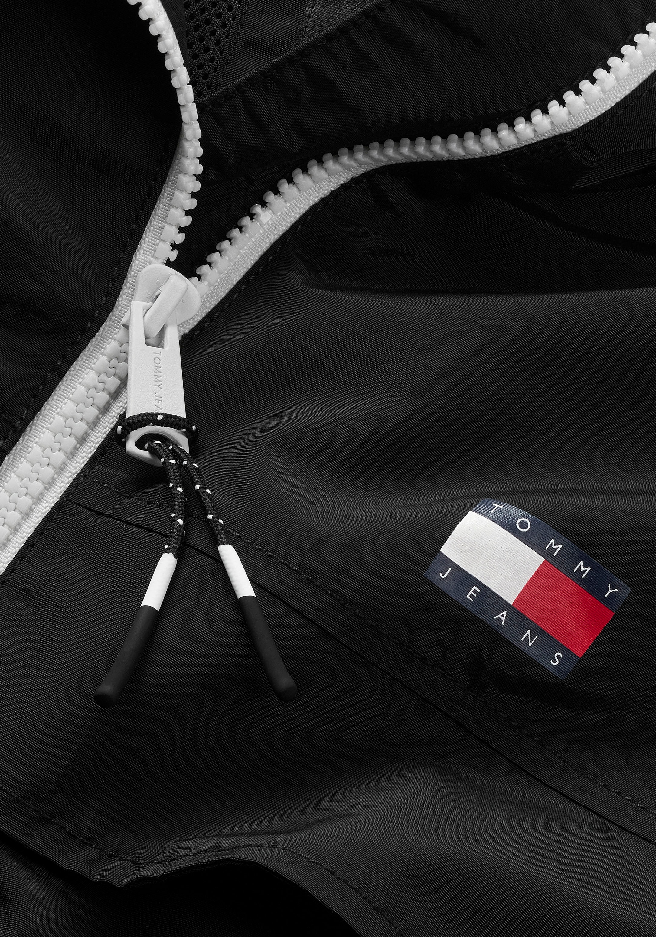 Tommy Jeans Windbreaker »TJW CHICAGO WINDBREAKER EXT«, mit Kapuze, mit kontrastfarbenen Reißverschlüssen