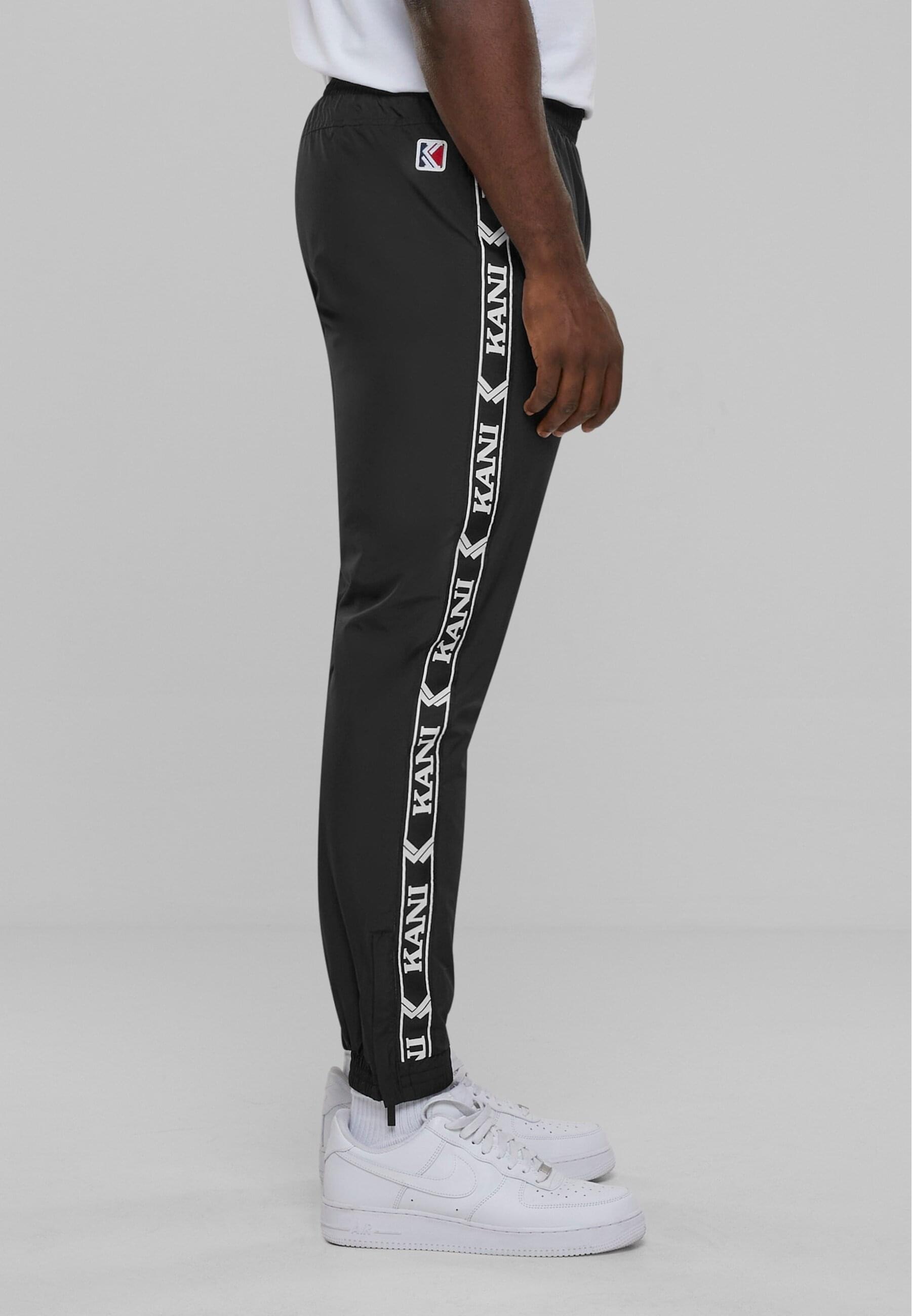 Karl Kani Jogginghose »Karl Kani Herren KKMQ32025BLK KK OG Tape Trackpants«