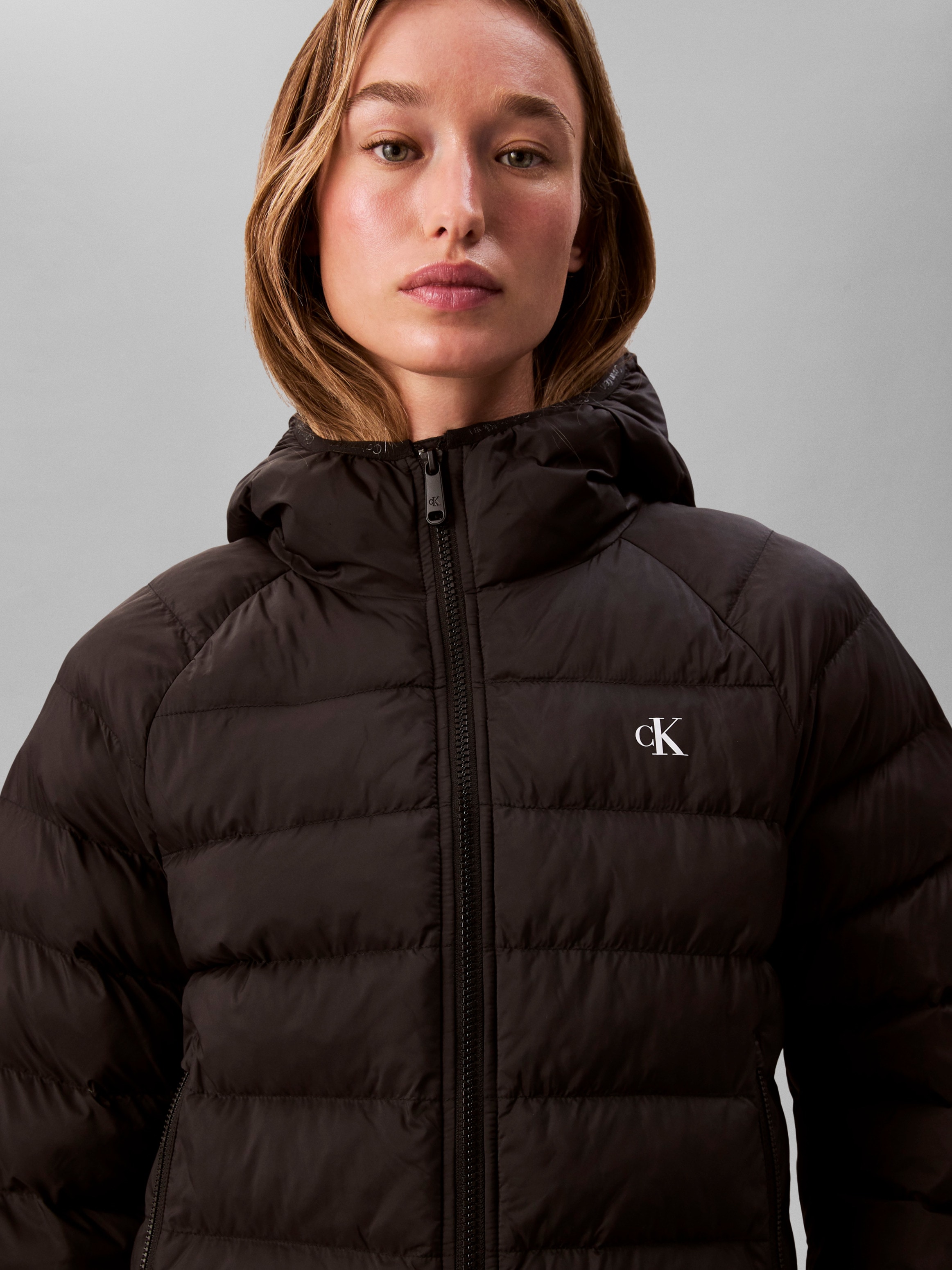 Calvin Klein Jeans Steppjacke »LGHTWGHT QLTD JCKT P« mit Kapuze Mit Rundhalsausschnitt