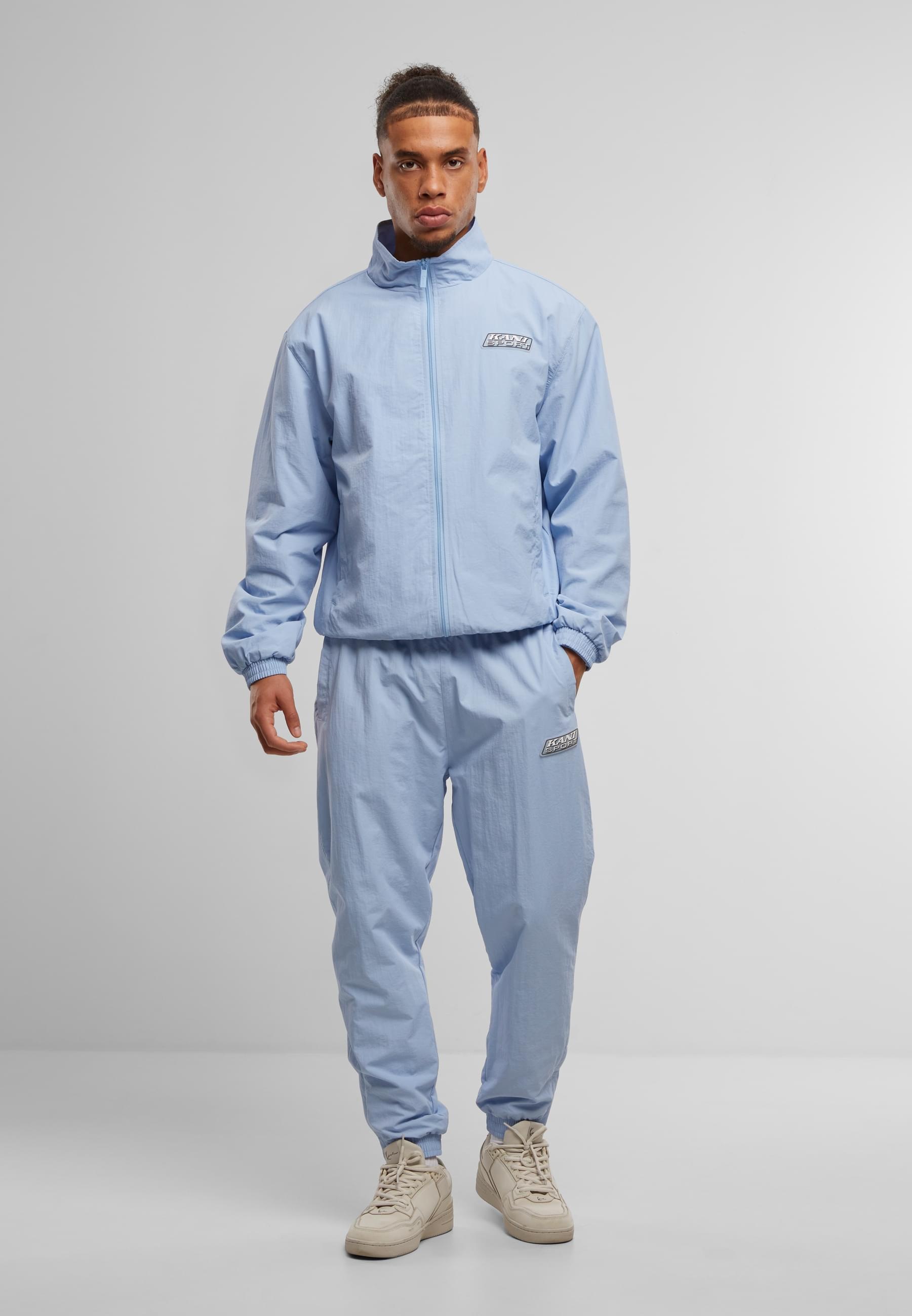 Karl Kani Trainingsjacke »Karl Kani KM-JK035--090-32 Sport Patch Essential Trackjacket« 1 Stk. tlg. ohne Kapuze