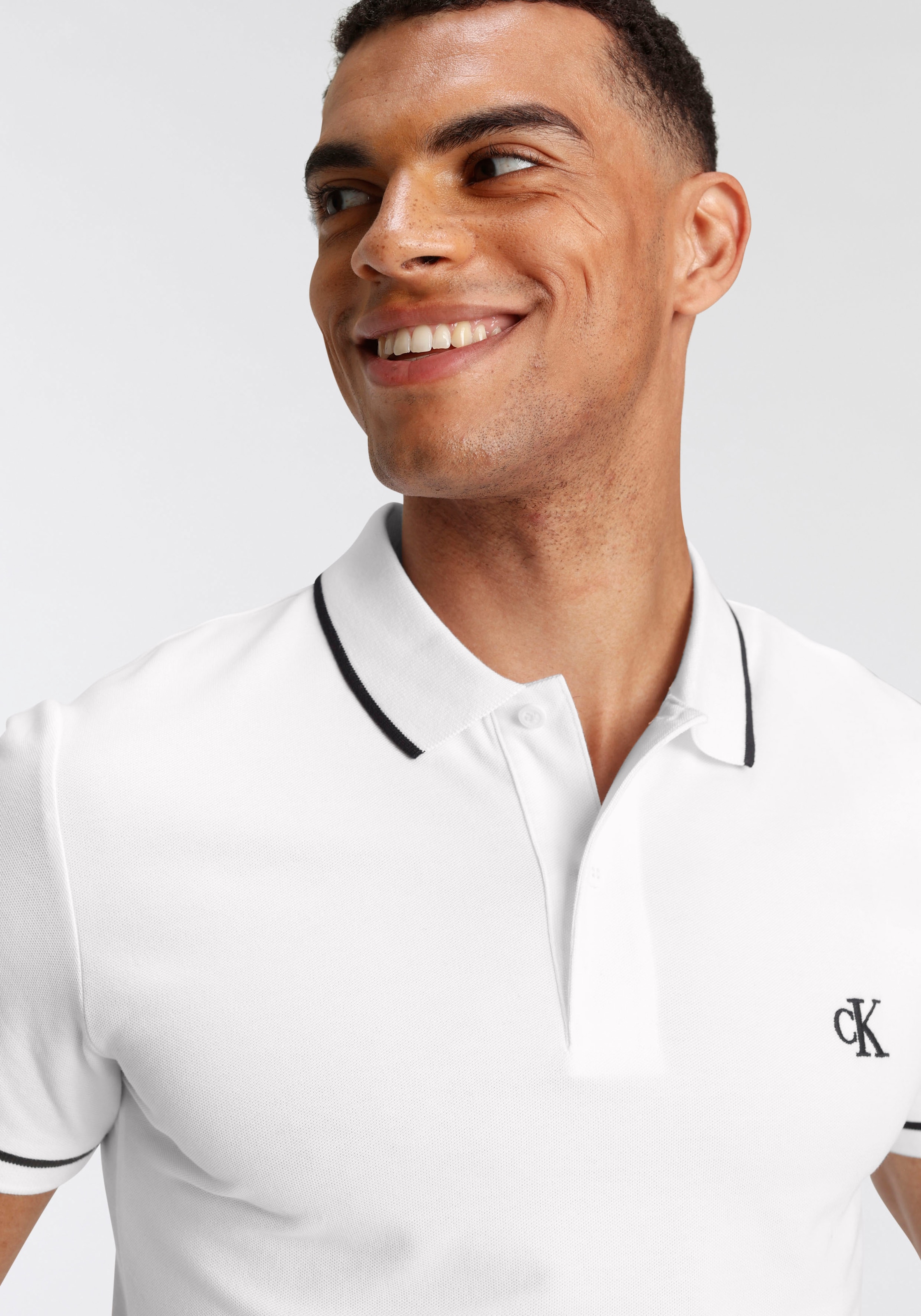 Calvin Klein Jeans Poloshirt »TIPPING SLIM POLO«, mit Logomarkenlabel