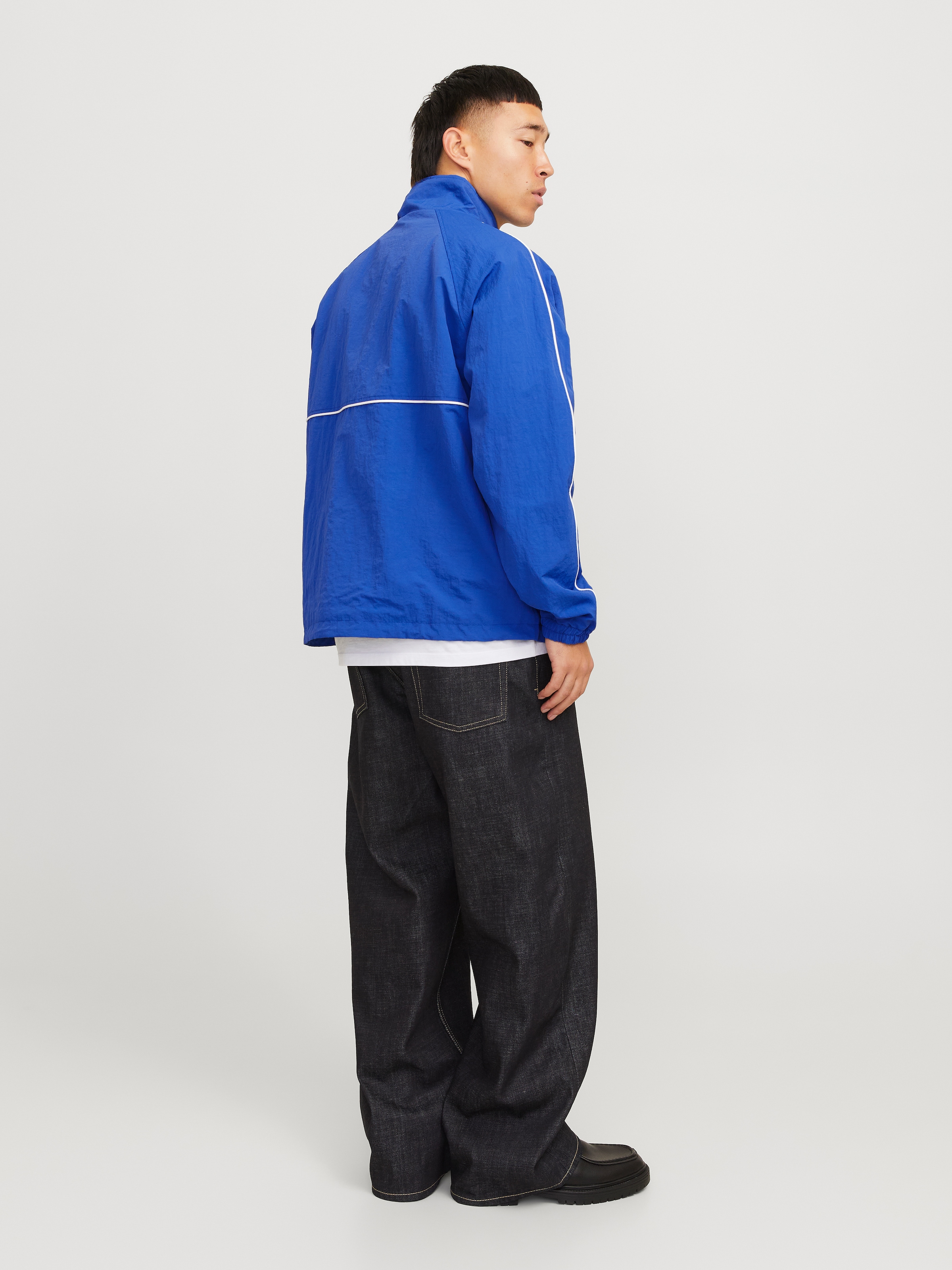 Jack & Jones Outdoorjacke »JCOUNION TRACK JACKET SN«, ohne Kapuze, Mit stylischem Print