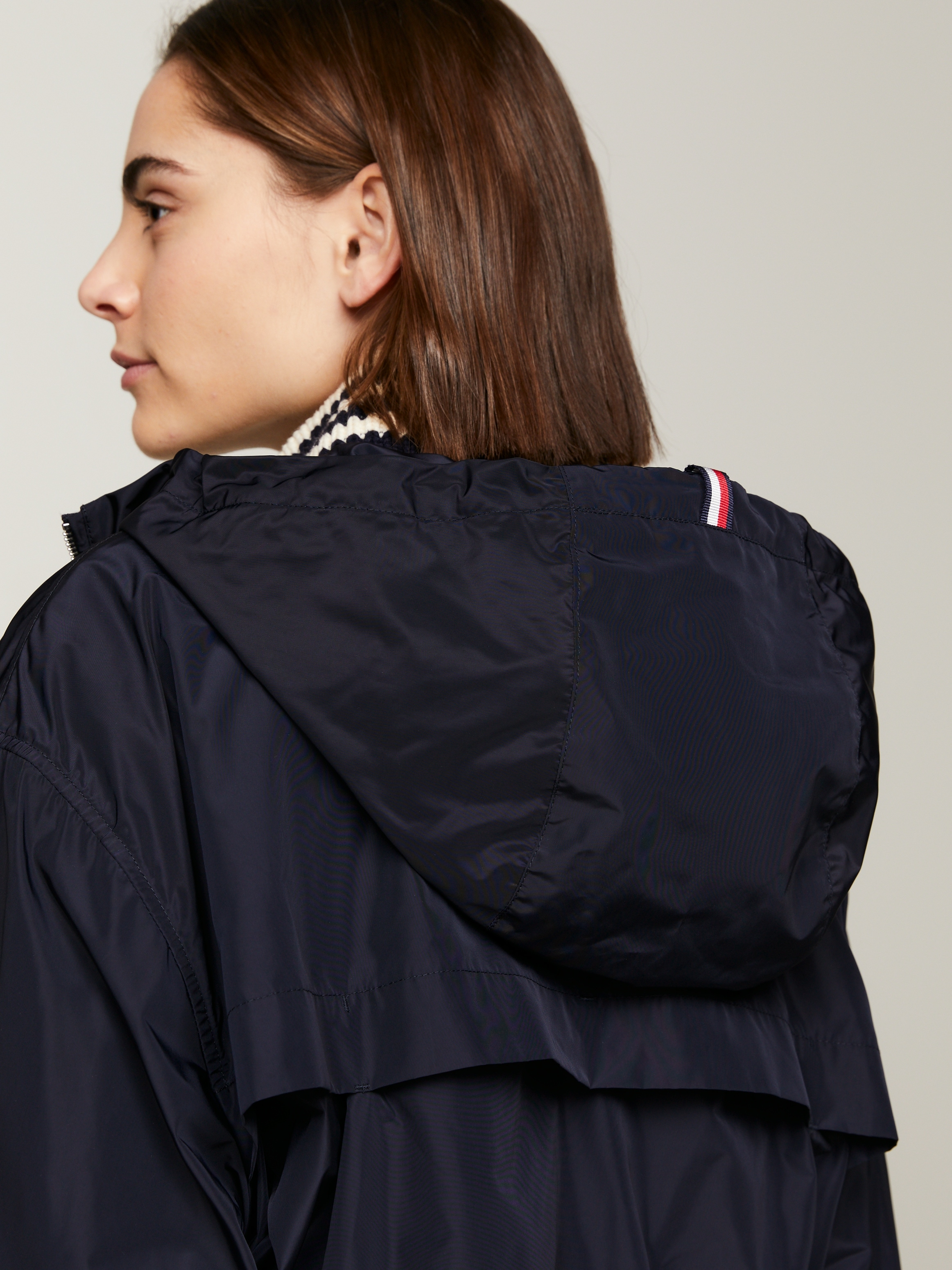 Tommy Hilfiger Windbreaker »TRANSITIONAL WINDBREAKER PARKA«, mit Kapuze, mit Sturmriegel hinten