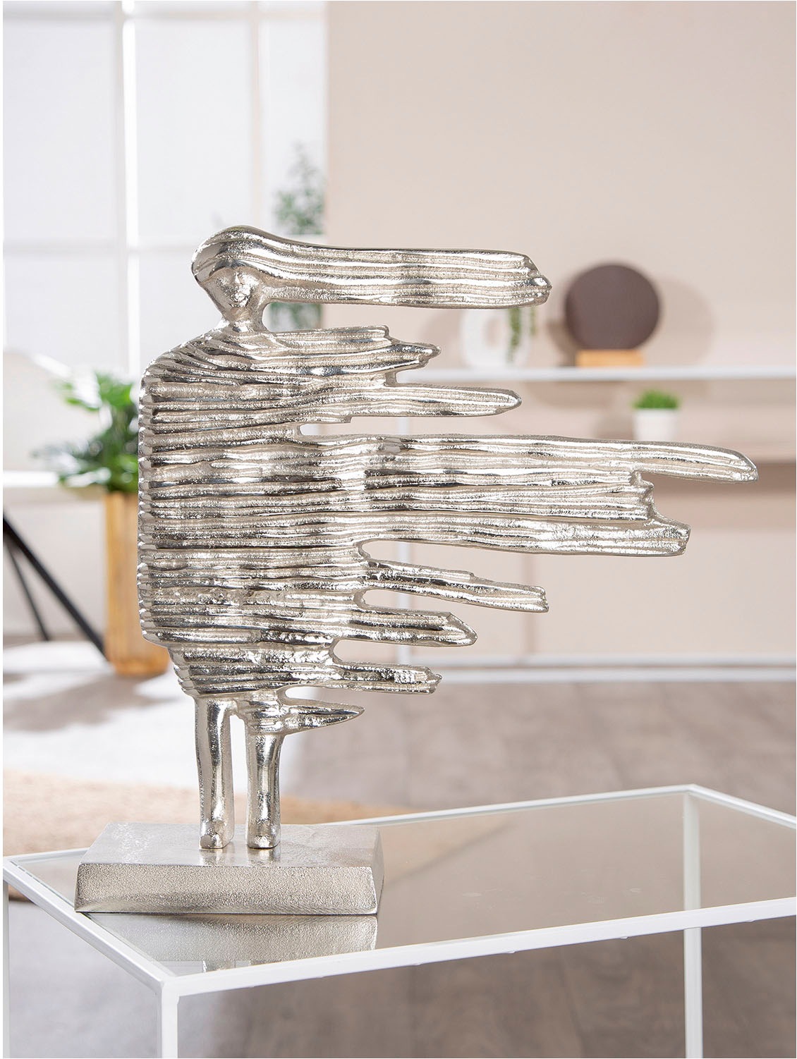 GILDE Dekofigur »Skulptur Verwehung silberfarben H. 38 cm« günstig online kaufen