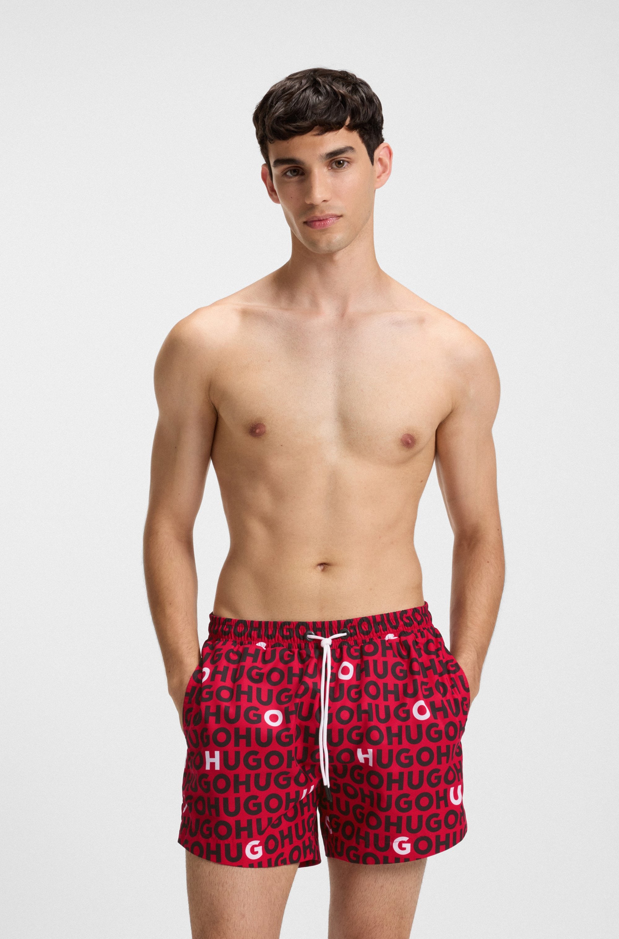 HUGO UNDERWEAR Badehose »TORTUGA« mit Allover-Logoschriftzug Medium Red 612 XL (54) - N-Gr N-Gr XL (54) Designer-Badehose von HUGO Underwear