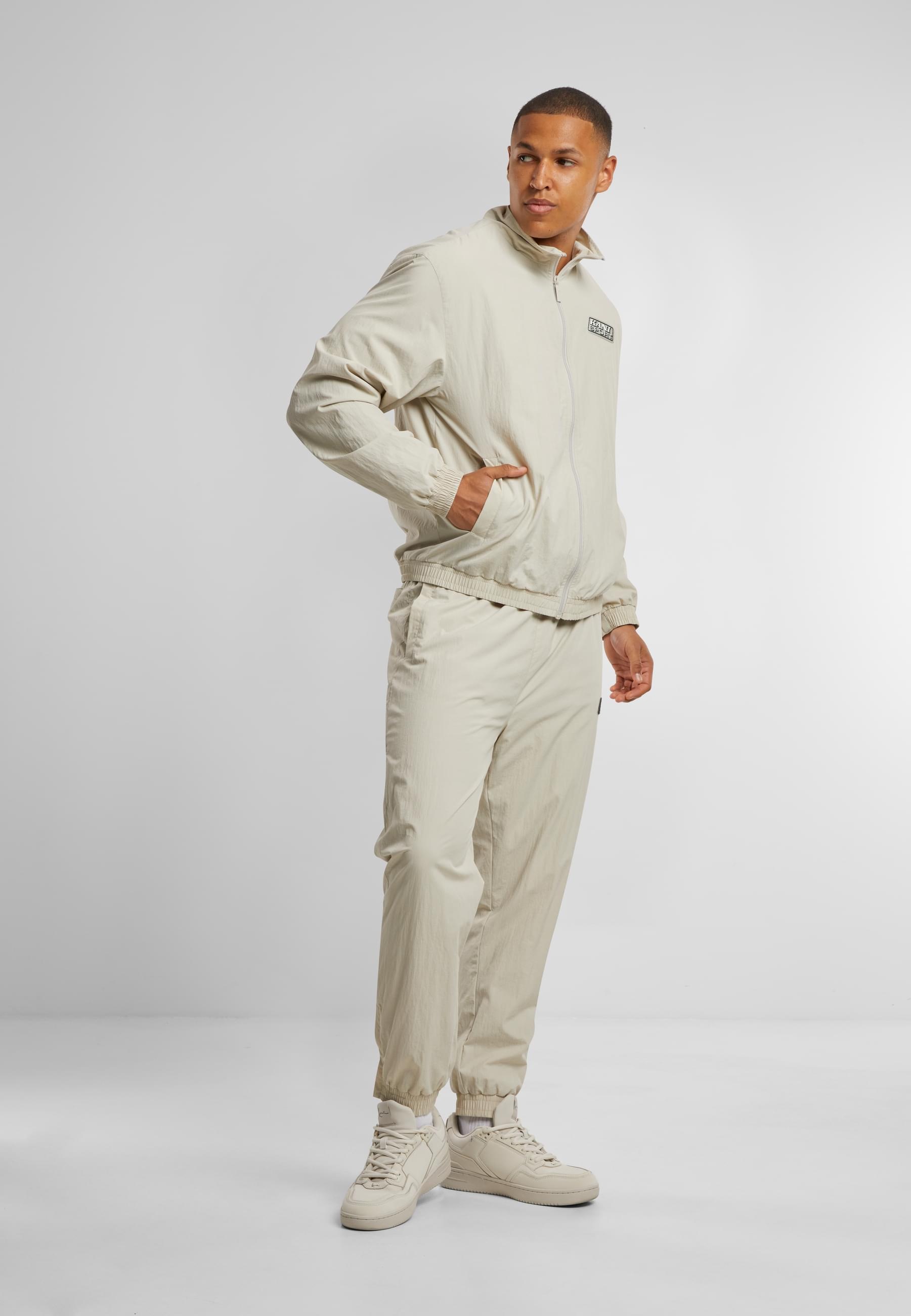 Karl Kani Trainingsjacke »Karl Kani Sport Patch Essential Trackjacket« 1 Stk. tlg. ohne Kapuze