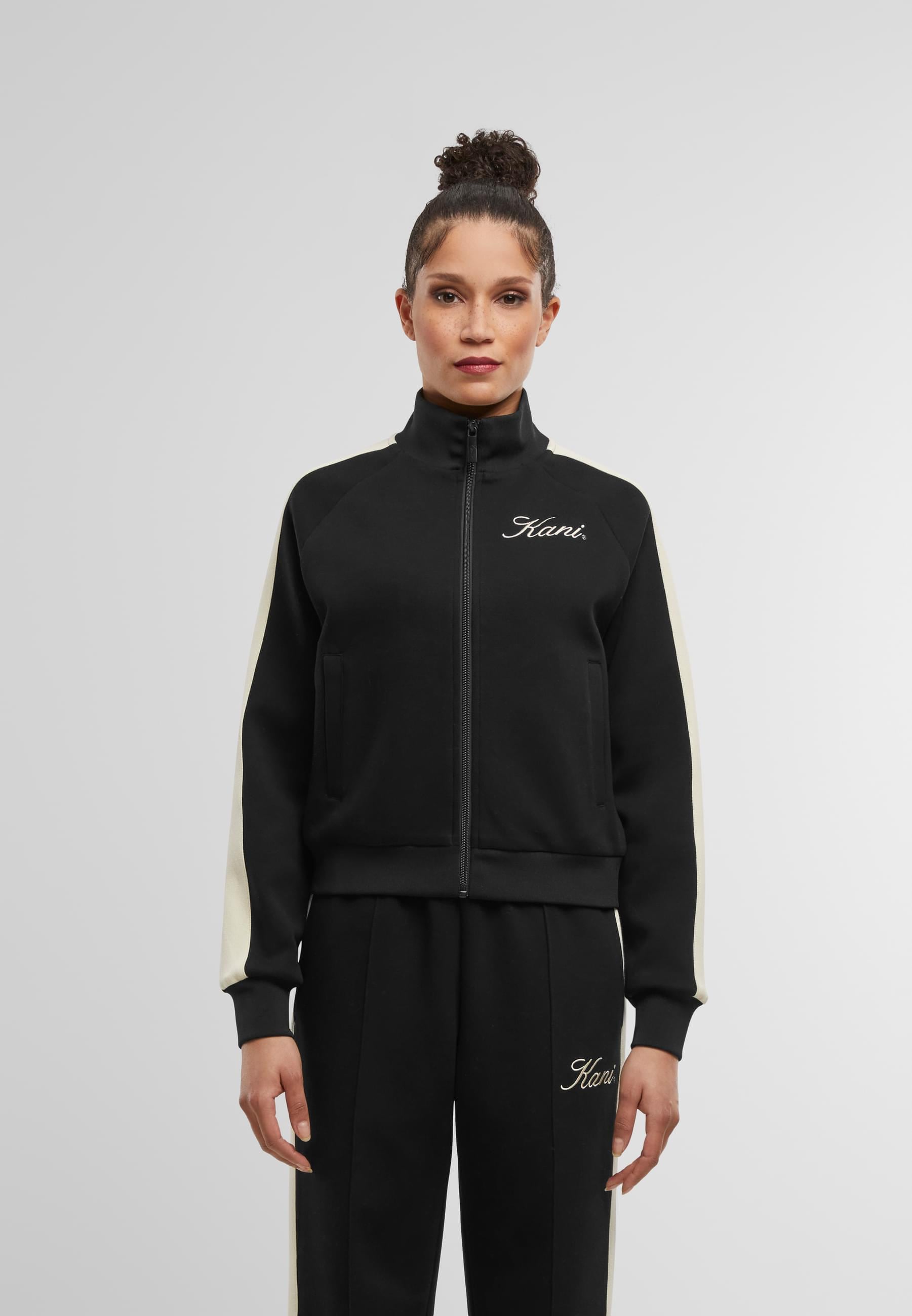 Karl Kani Trainingsjacke »Karl Kani Kani Script Sidestripe Trackjacket« 1 Stk. tlg. ohne Kapuze