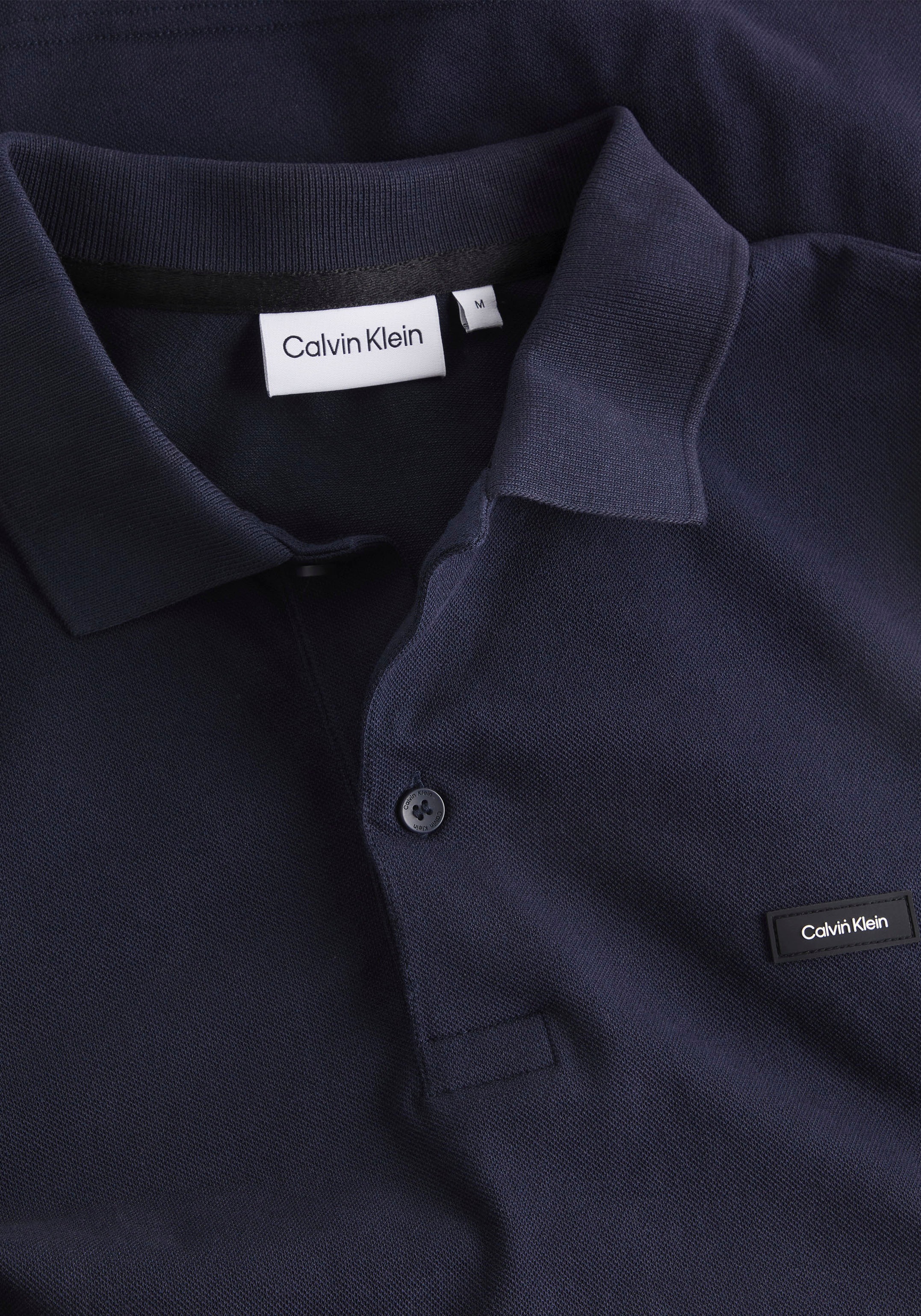 Calvin Klein Poloshirt, mit Calvin Klein Logo auf der Brust