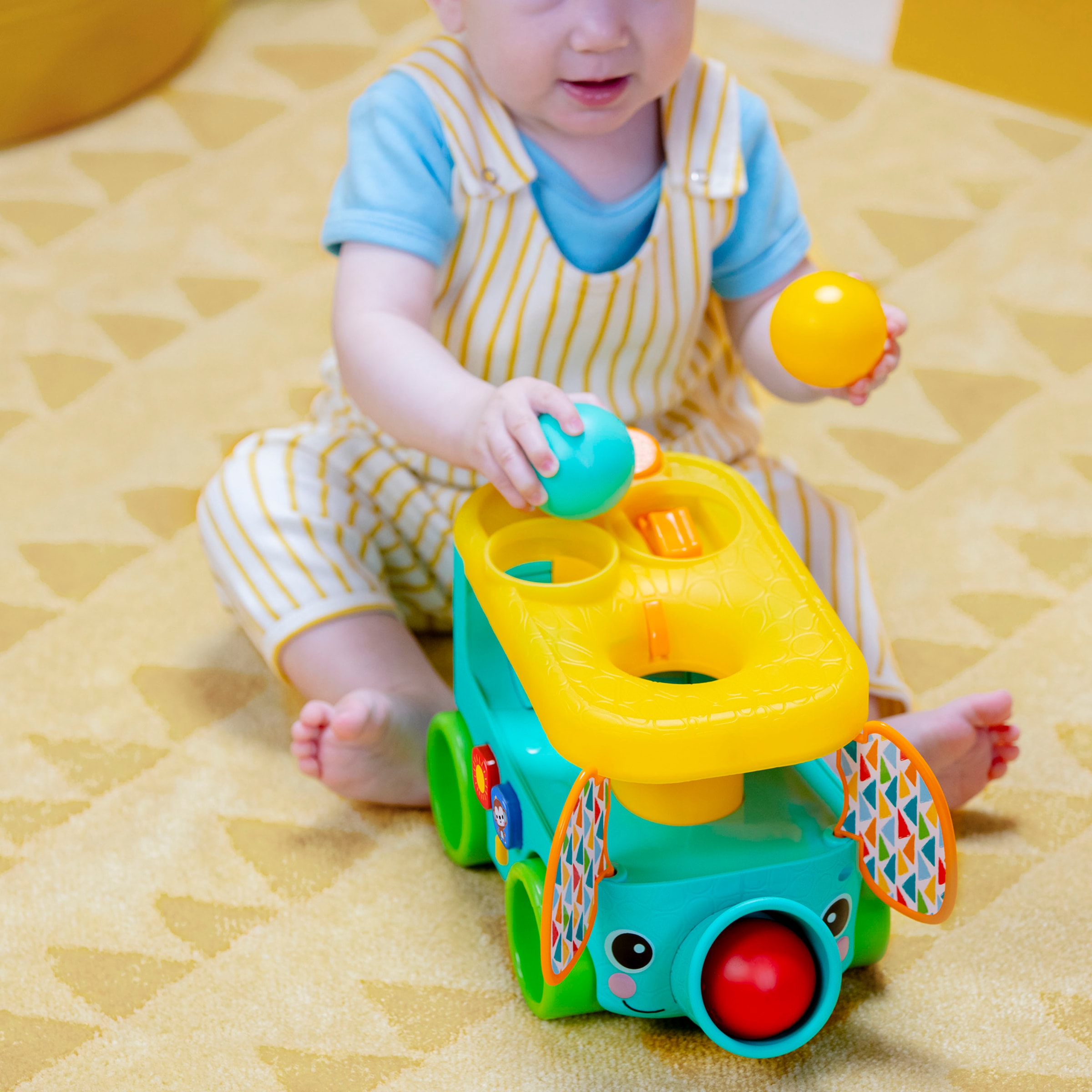 Bright Starts Lernspielzeug »Pop & Roll Safari Bus Ball Play Toy«, mit Licht und Sound
