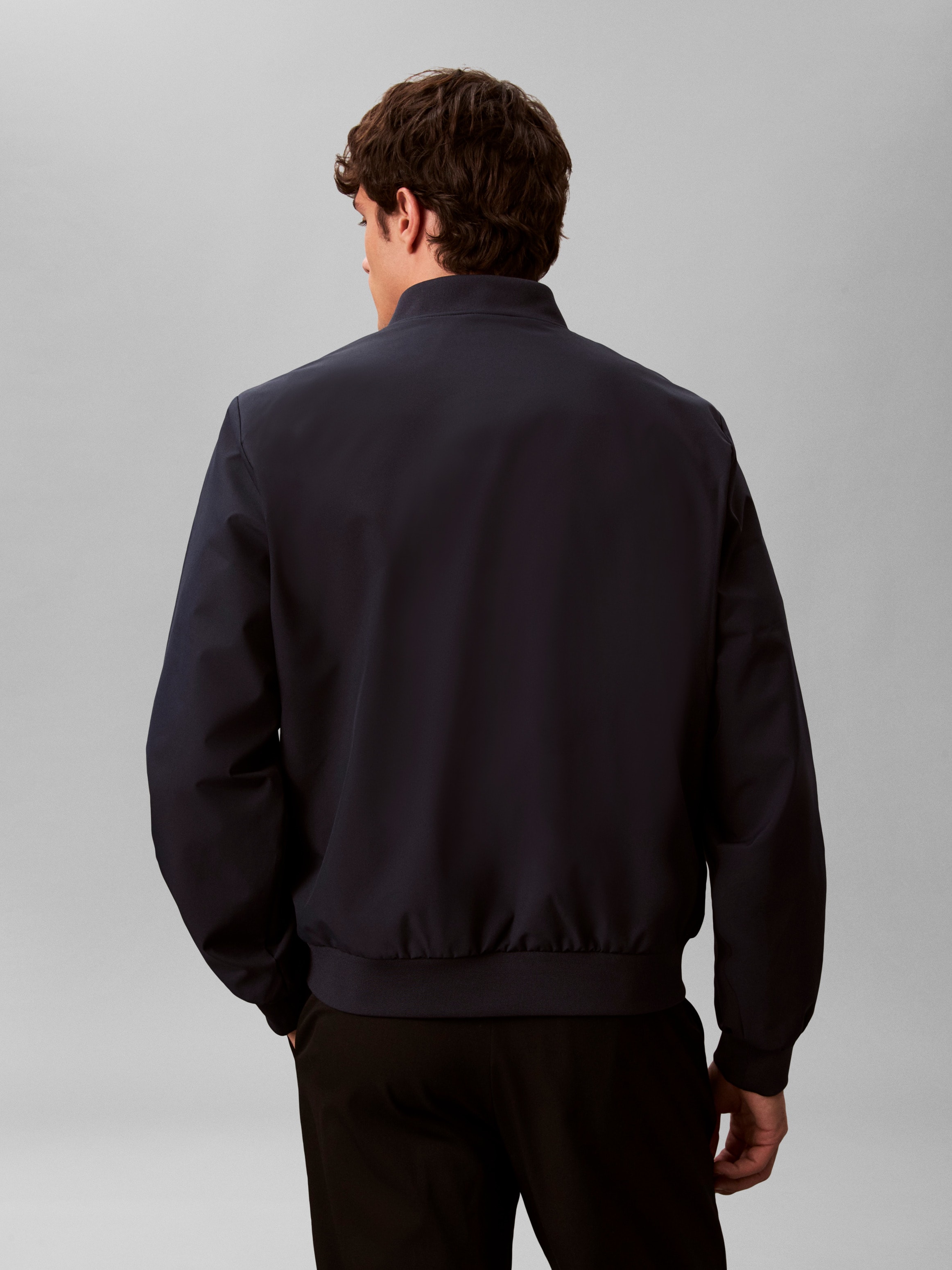 Calvin Klein Jeans Bomberjacke »LS SOFT TECH BOMBER JACKET« ohne Kapuze Regular fit mit Stehkragen