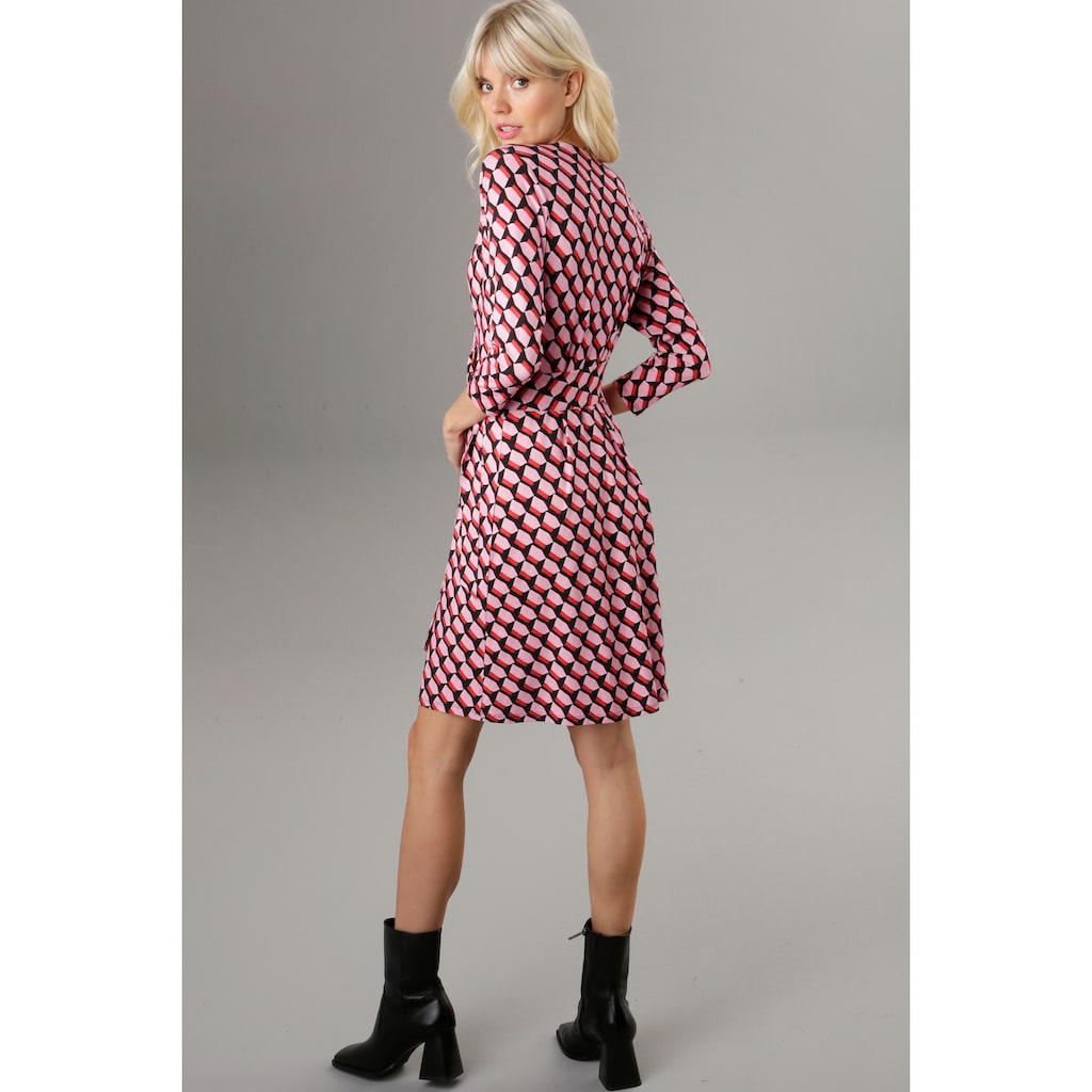 Aniston SELECTED Jerseykleid mit Allover-Muster und Ausschnitt in  Wickeloptik - NEUE KOLLEKTION