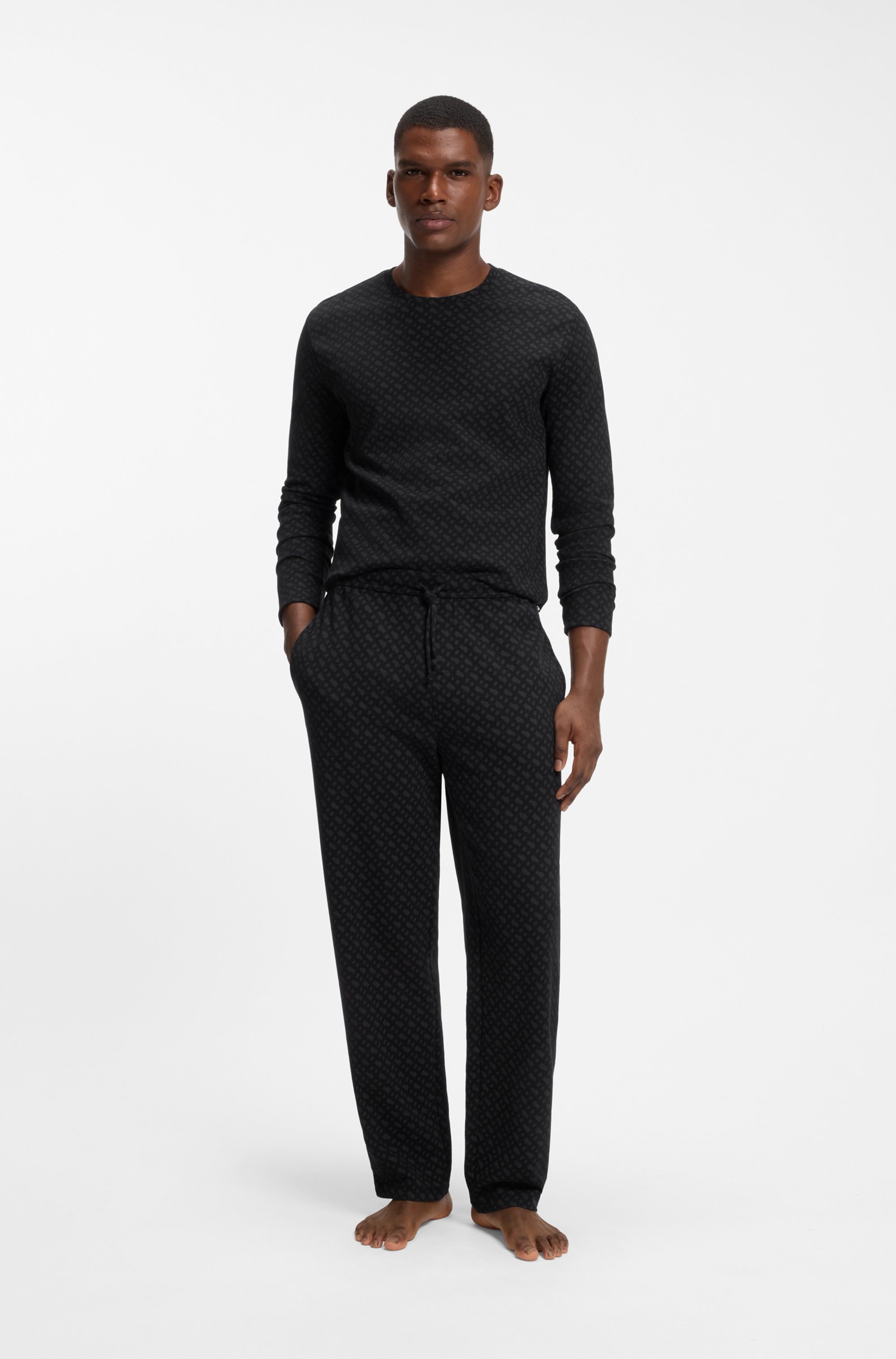 BOSS Pyjamahose »Waffle AOP Pants«  elastischer Bund mit Kordel, Seitentaschen, Allover-Druck