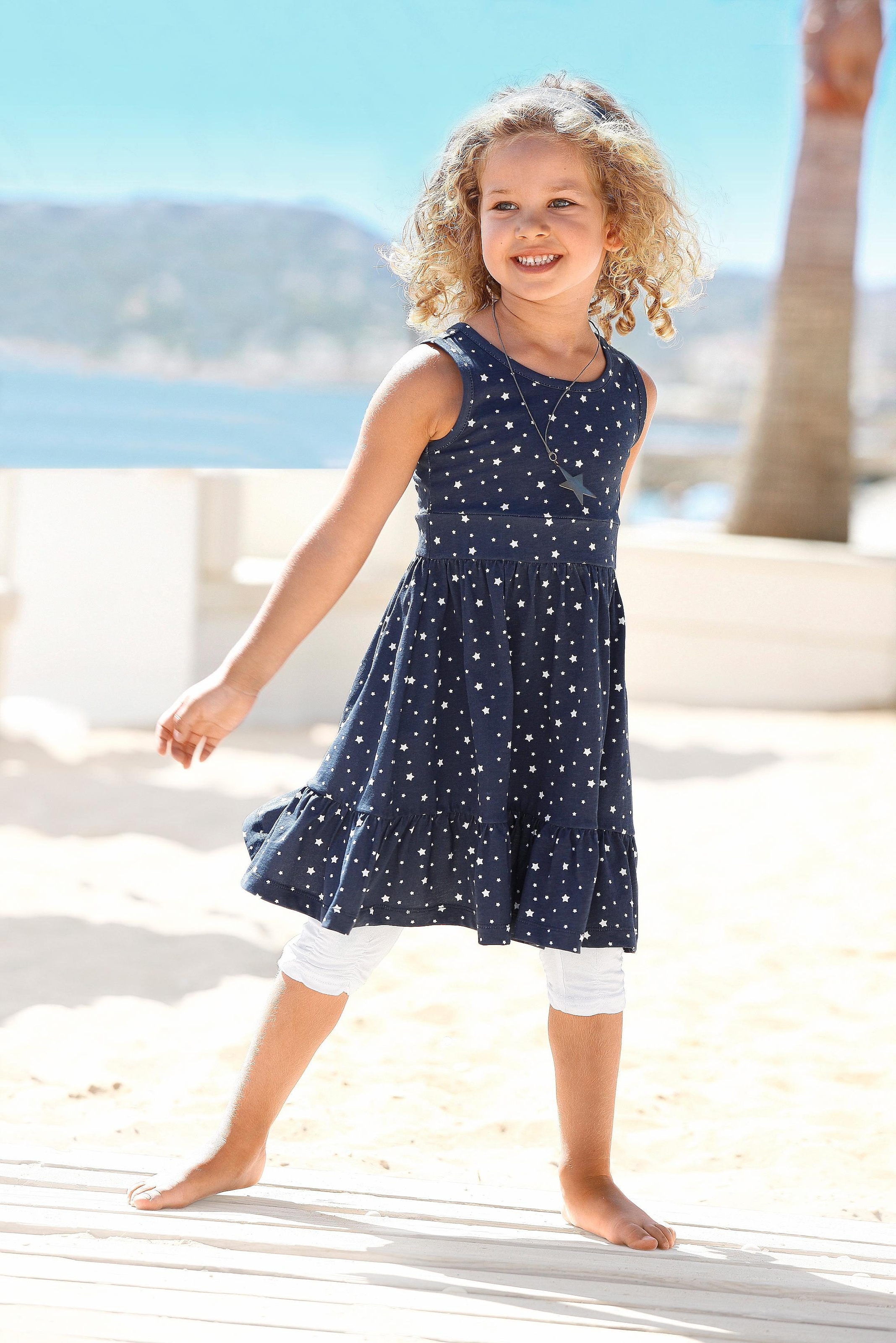 KIDSWORLD Jerseykleid »2tlg. Shirtkleid + Haarband im niedlichen Sternen-Allover«, (Set, 2 tlg.), festliche Anlässe, knielang, verspielter Stil, aus Baumwolle