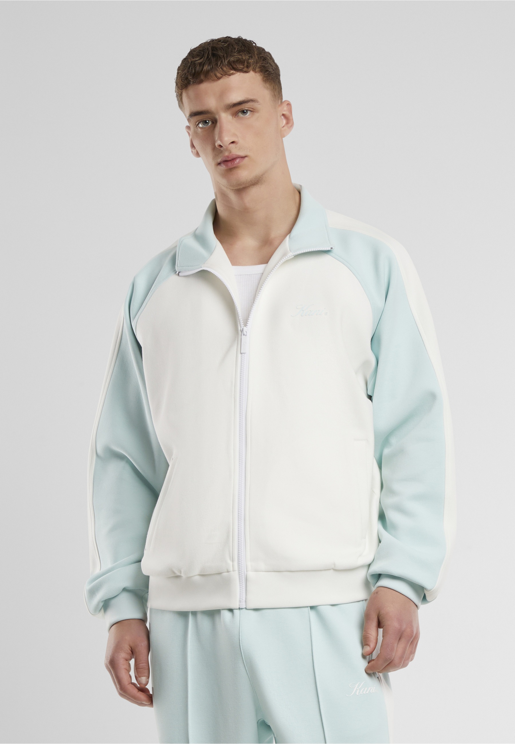 Karl Kani Trainingsjacke »Karl Kani Kani Sidestripe Trackjacket« 1 Stk. tlg. ohne Kapuze