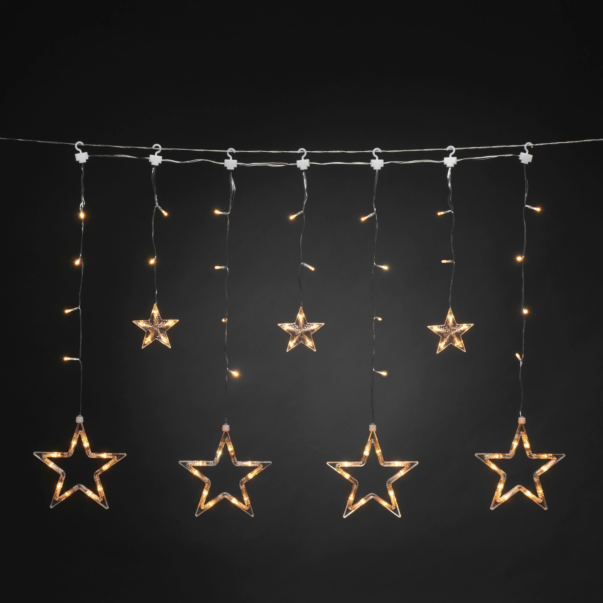 KONSTSMIDE LED-Lichtervorhang »LED Solar Sternen Lichtervorhang, 77 bernsteinfarbene Dioden«, 77 St.-flammig, Fernbedienbar, 8 Lichtfunktionen, Timer, 
Solarbox über USB aufladbar