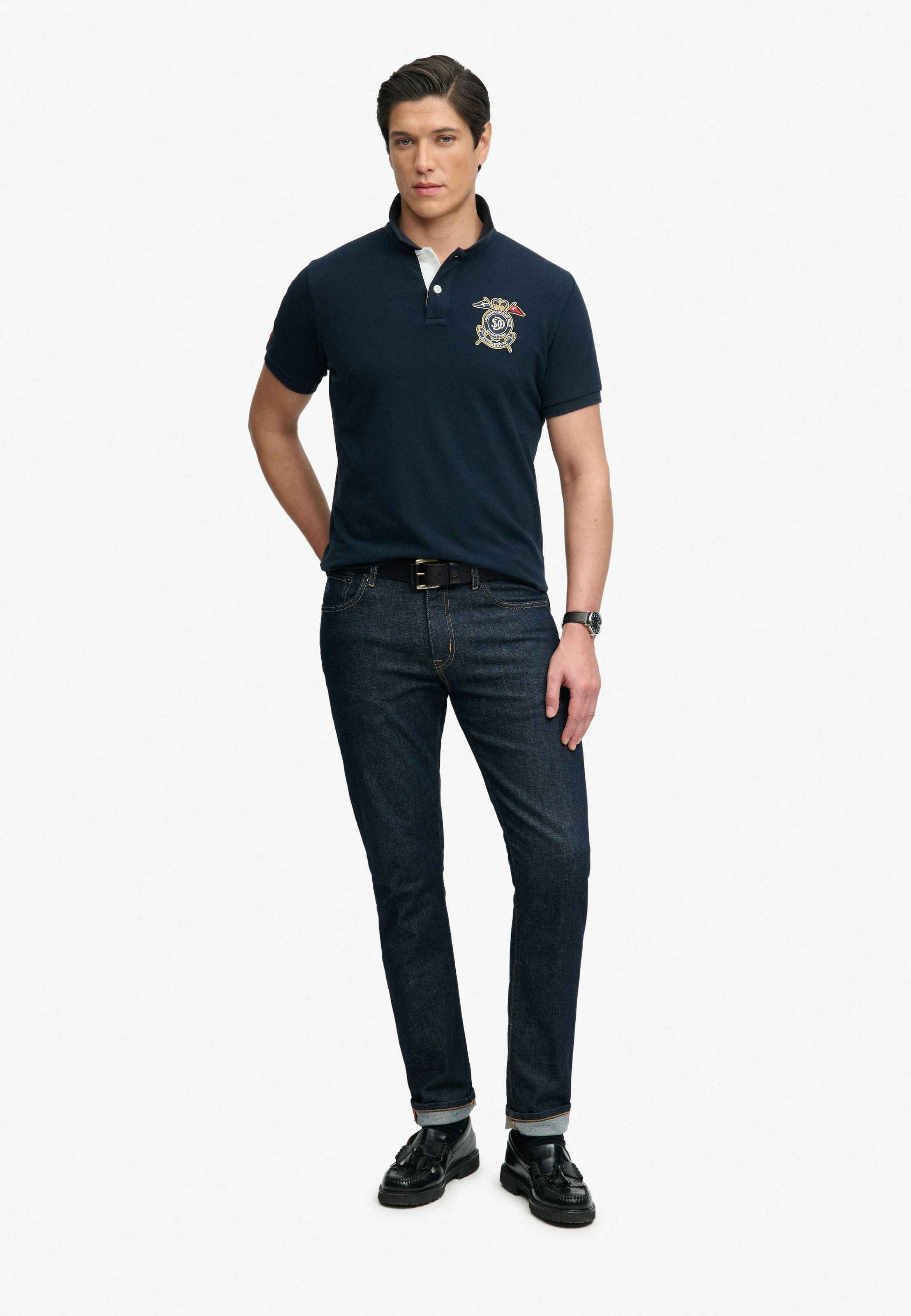 Superdry Poloshirt »CREST POLO« mit Markenlabel, aus Baumwolle, Relaxed Fit, bedruckte Optik