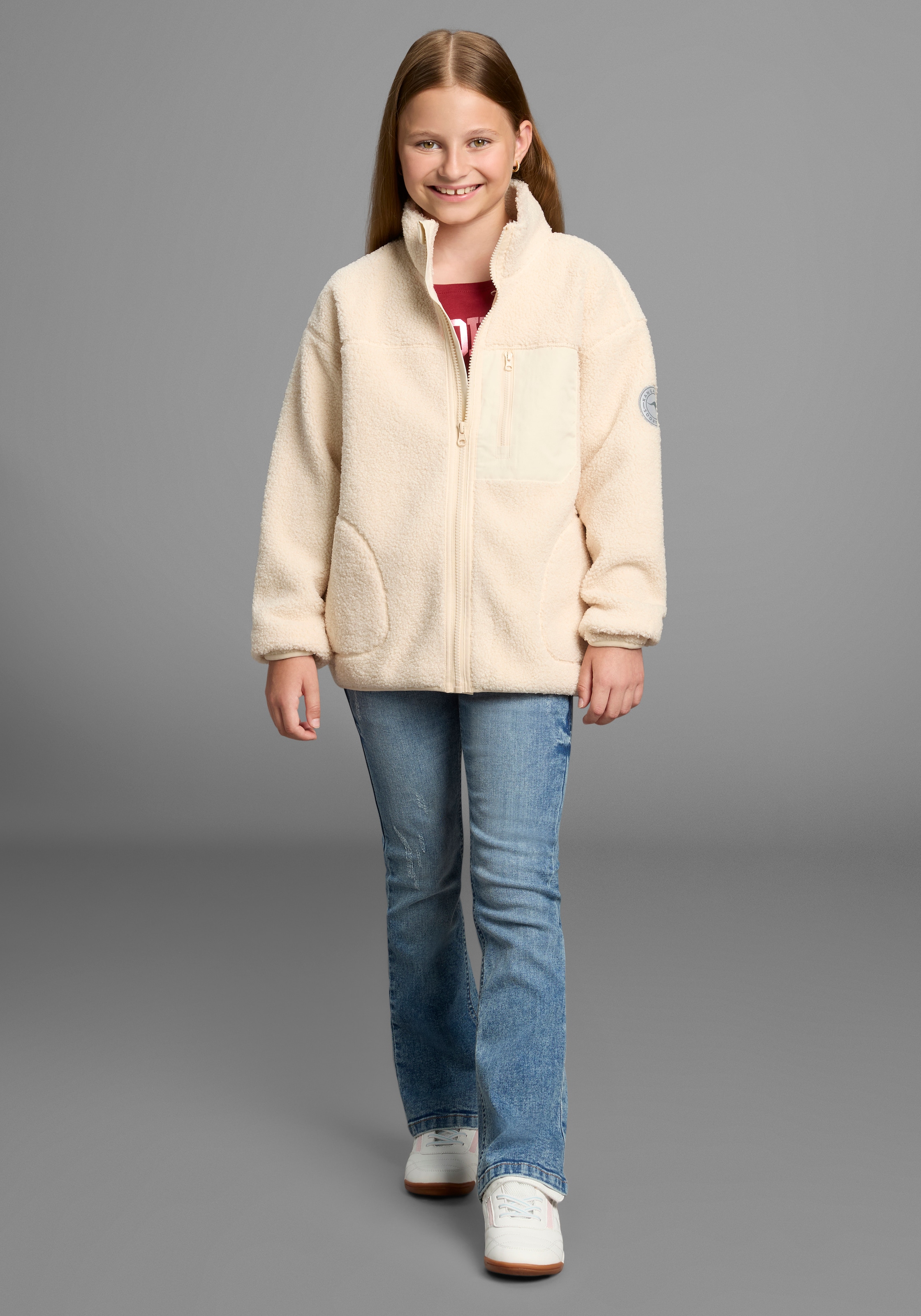 KangaROOS Sweatjacke »Fleecejacke, Kuschel-Jacke mit reflektierendem Badge« Weicher Teddyplüsch