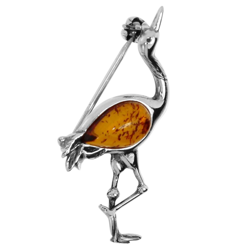 OSTSEE-SCHMUCK Brosche »Brosche Kranich Brosche Kranich« () 16 x 35 mm Silberbrosche mit Bernstein als Kranich gearbeitet