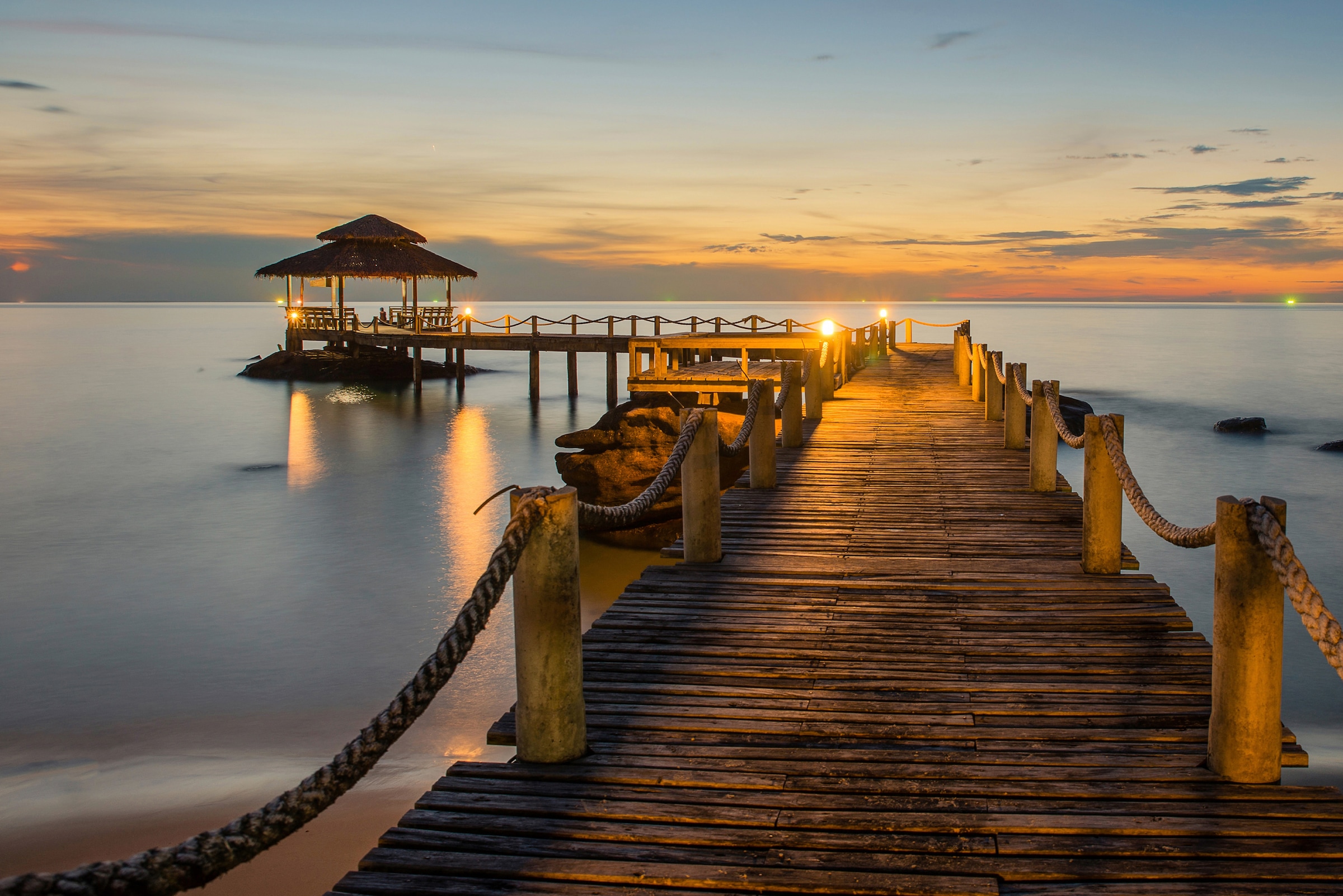 Papermoon Fototapete »Wooded bridge pier between sunset« günstig online kaufen