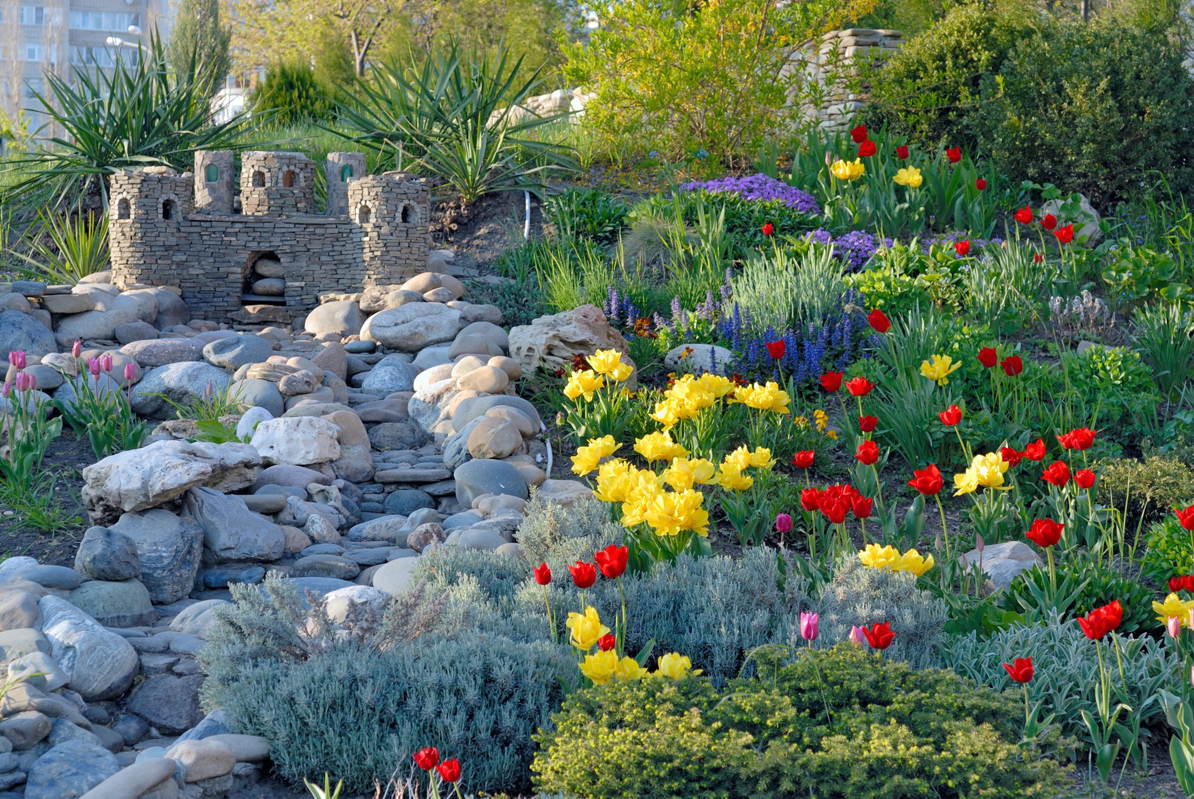 Papermoon Fototapete »GARTEN-BÄUME BLUMEN PFLANZEN PARK STEINE GRÜN BLÜTEN« günstig online kaufen