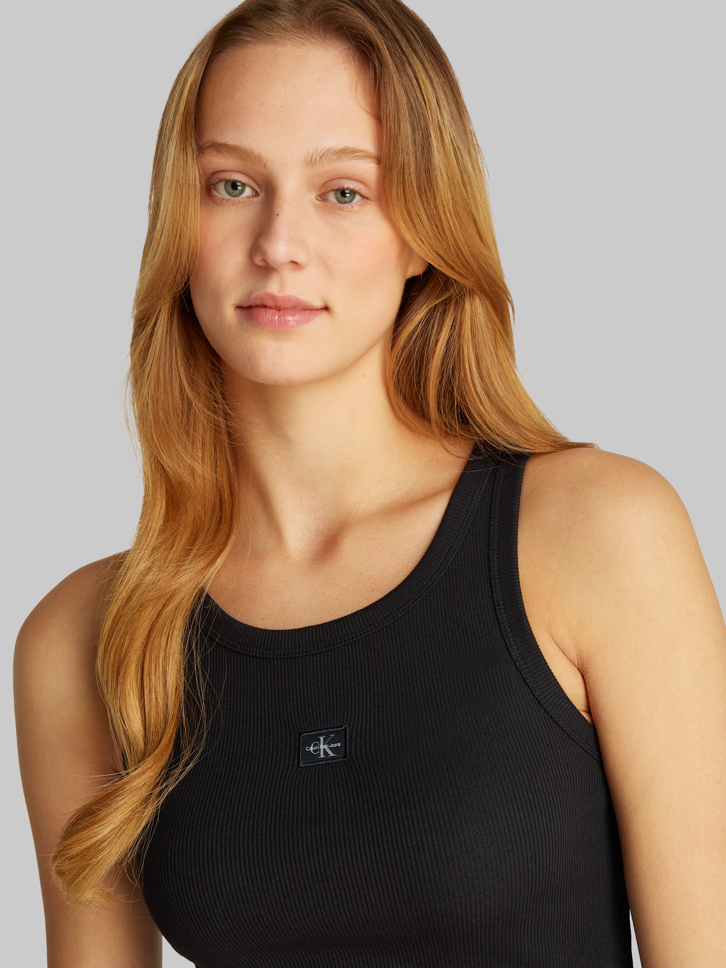 Calvin Klein Jeans Tanktop »WOVEN LABEL RIB TANK TOP«, mit Logodruck