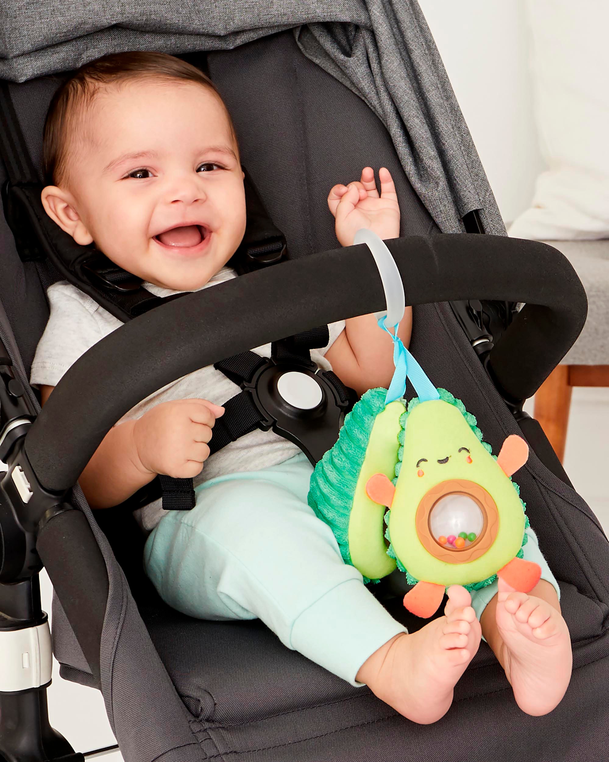 Skip Hop Greifling »Kinderwagenrassel Avocado«