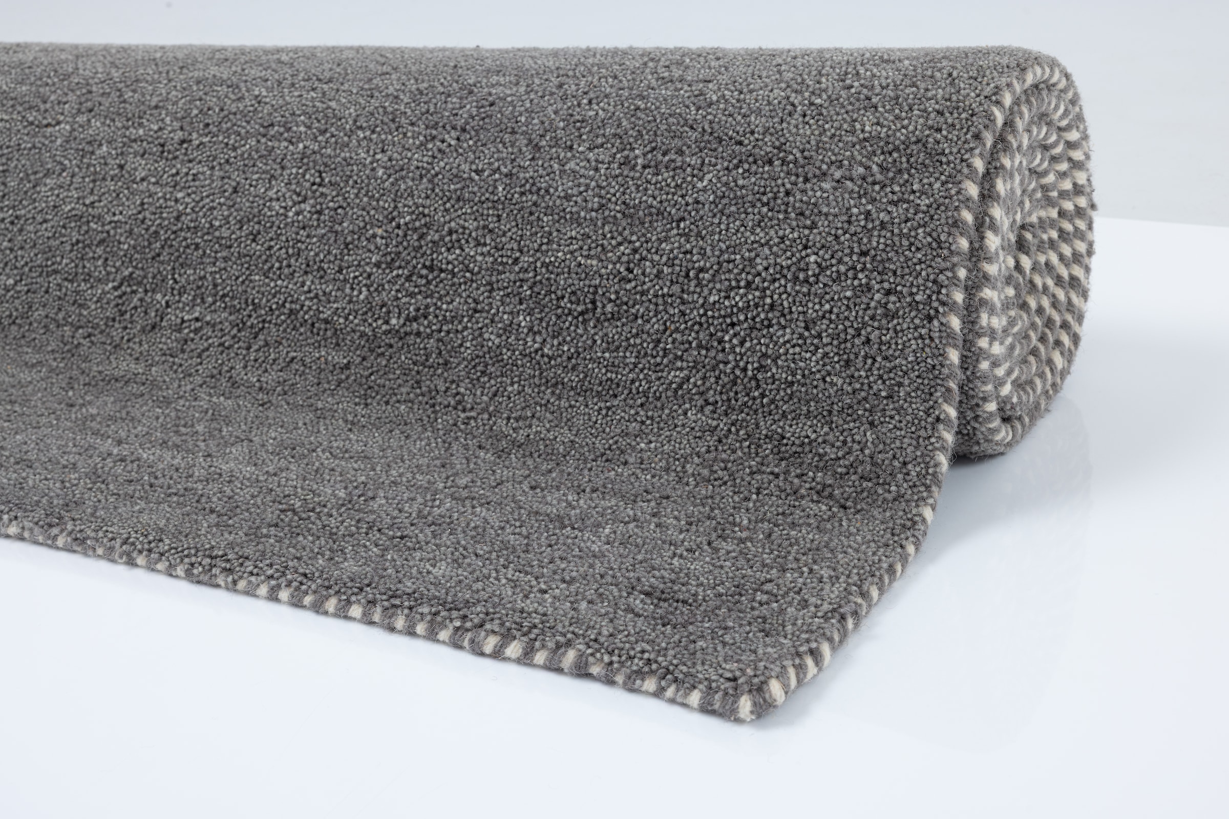 THEKO Wollteppich »Gabbeh Uni, Handgefertigt, meliert, auch als Läufer erhältlich, Wolle« rechteckig 14 mm Höhe Schlafzimmer, Wohnzimmer, Esszimmer, auch als Läufer oder rund