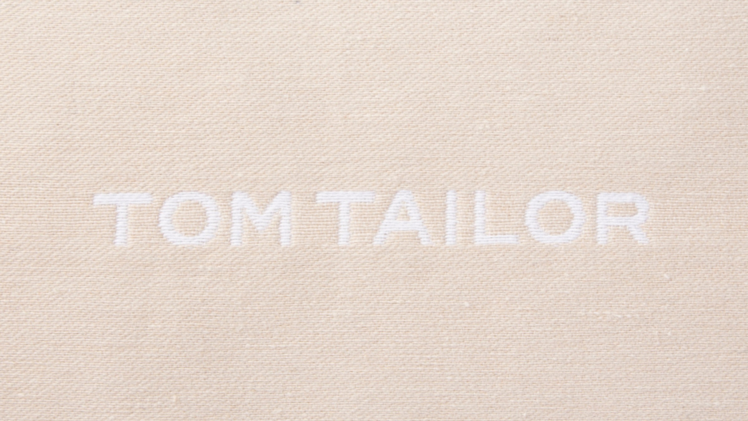 TOM TAILOR HOME Dekokissen »Logo«, bequem ohne eingewebtem und Markenlogo, 1 Kissenhülle Füllung, schnell Stück mit bestellen