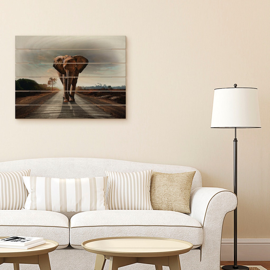 Artland Holzbild »Ein Elefant läuft auf der Straße«, Elefanten Bilder, (1 St.)