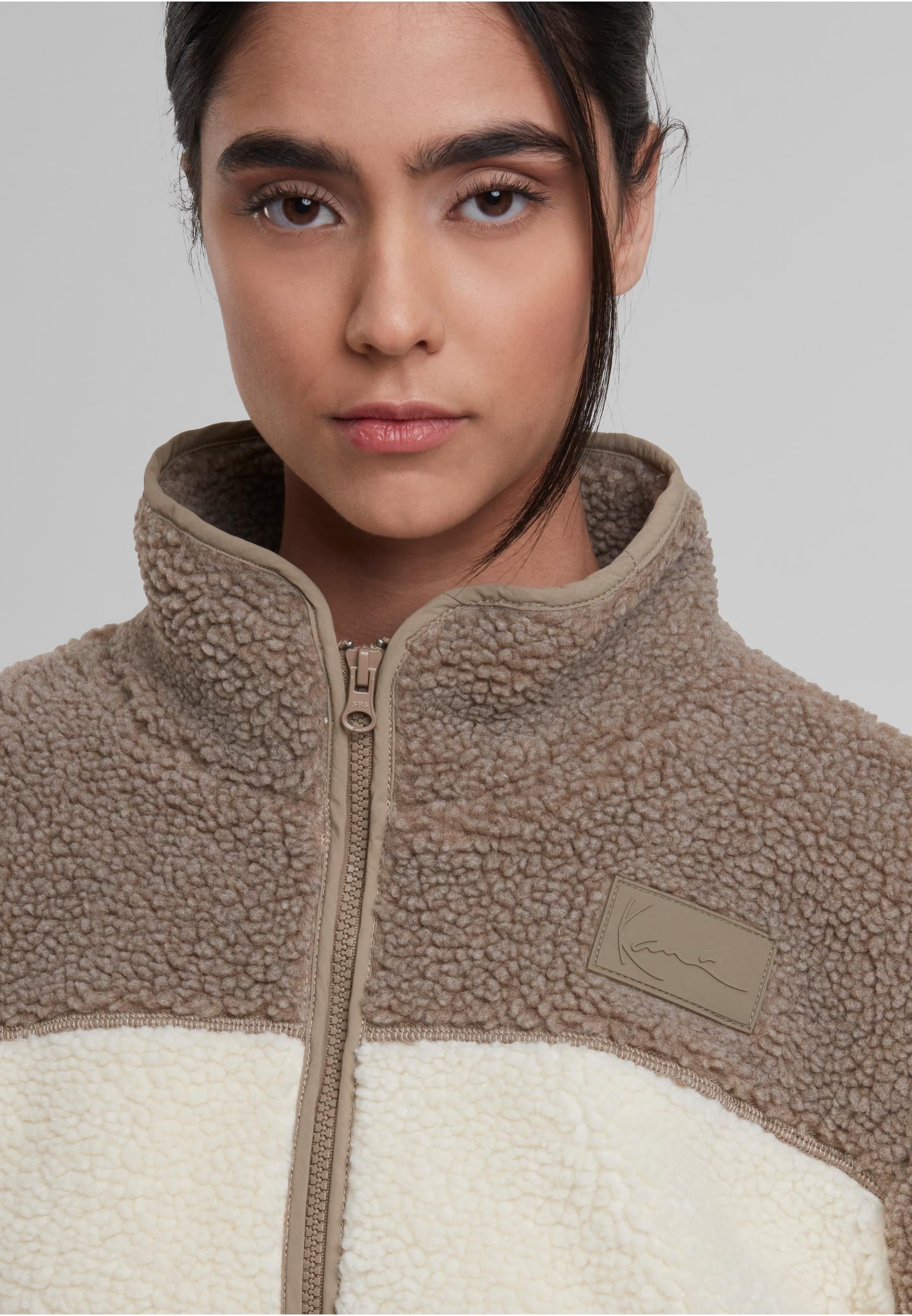 Karl Kani Trainingsjacke »Karl Kani Signature Teddy Trackjacket« 1 Stk. tlg. ohne Kapuze