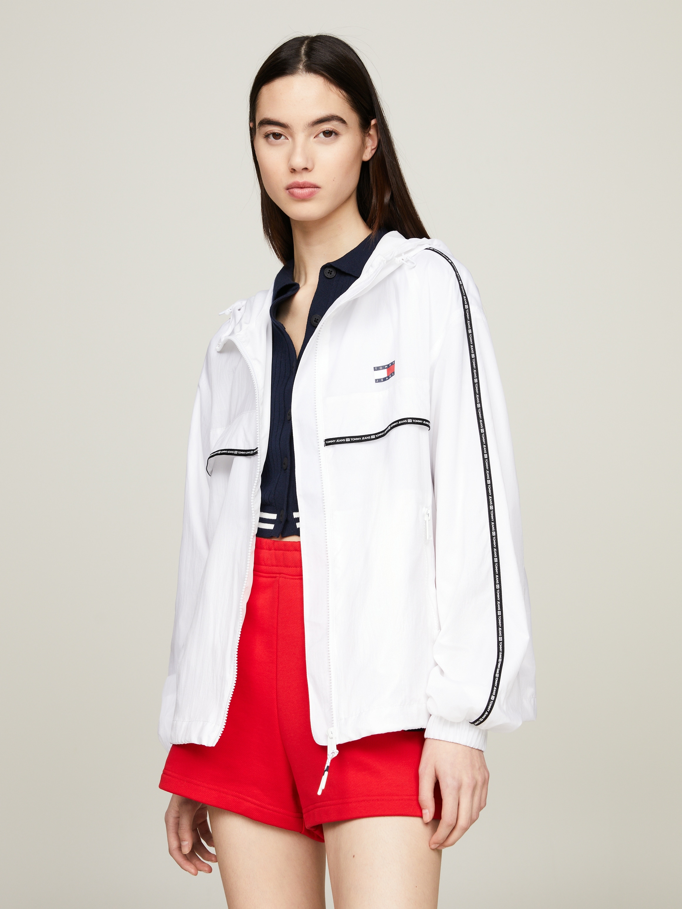 Tommy Jeans Windbreaker »TJW CHICAGO TAPE WINDBREAKER EXT«, mit Kapuze, mit Kapuze