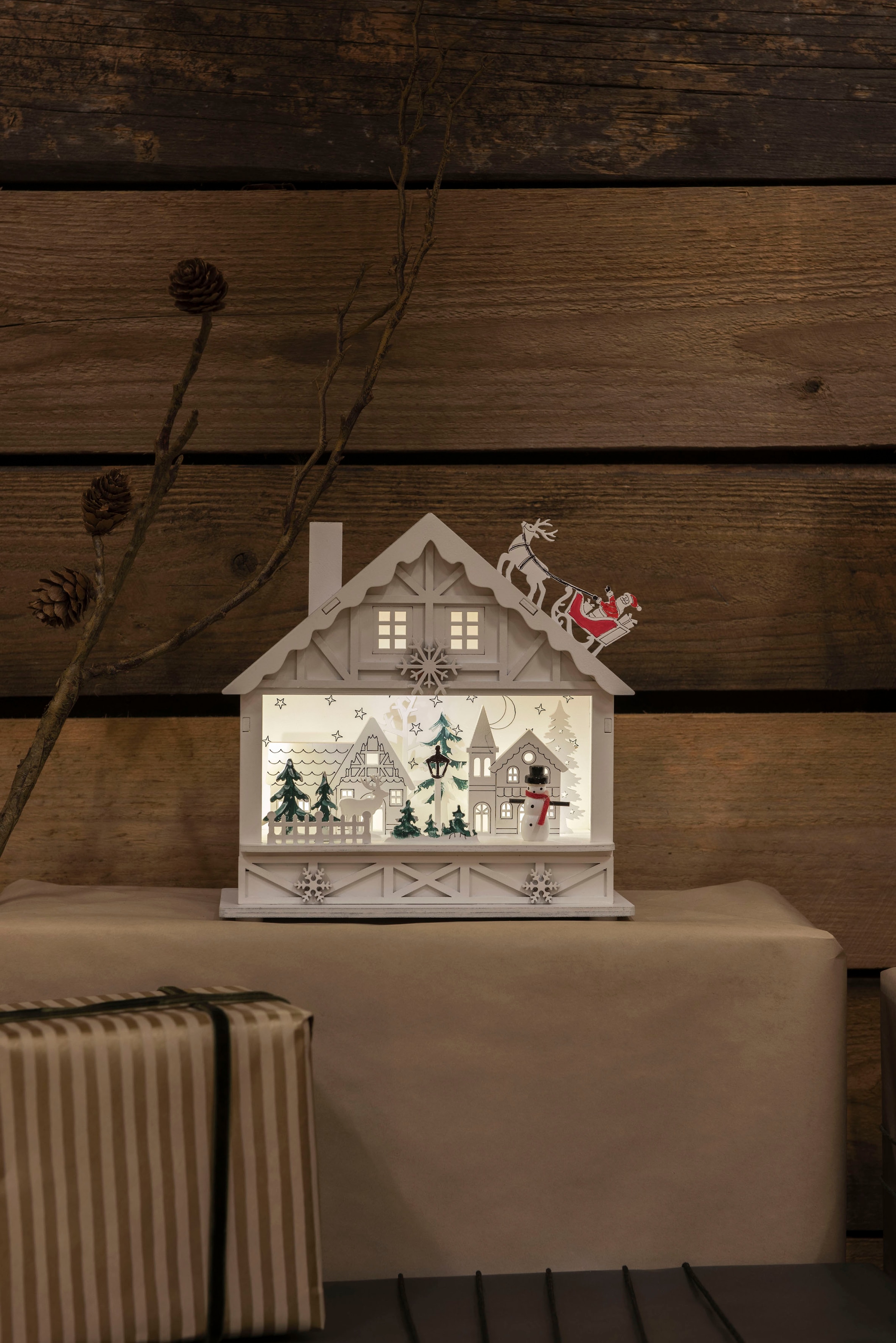 KONSTSMIDE Weihnachtshaus »LED Holzsilhouette Haus, weiß, 4 warmweiße Dioden,  batteriebetrieben«, 6h Timer bestellen