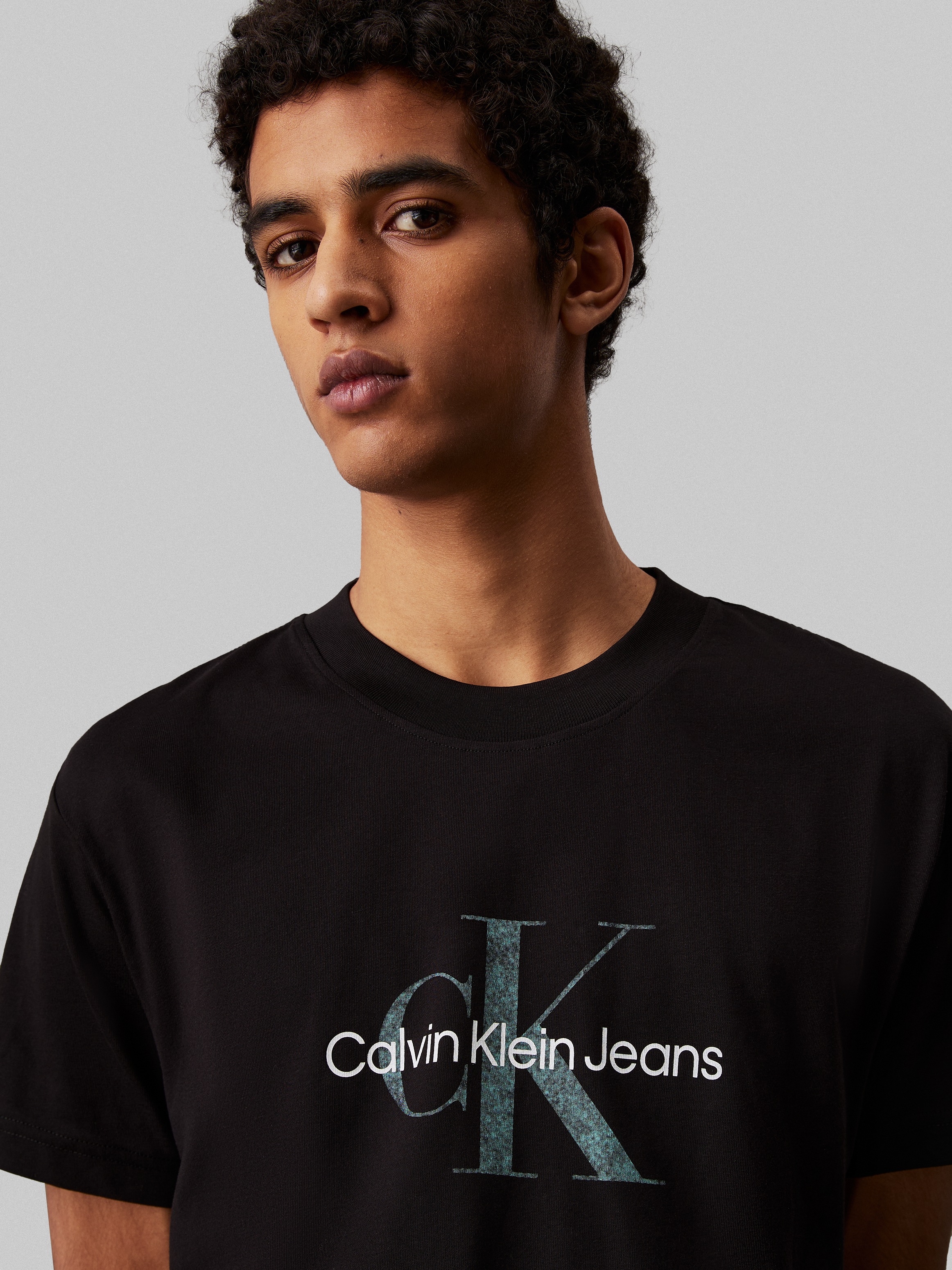 Calvin Klein Jeans Rundhalsshirt »TEXTURED MONOLOGO TEE«, Logodruck