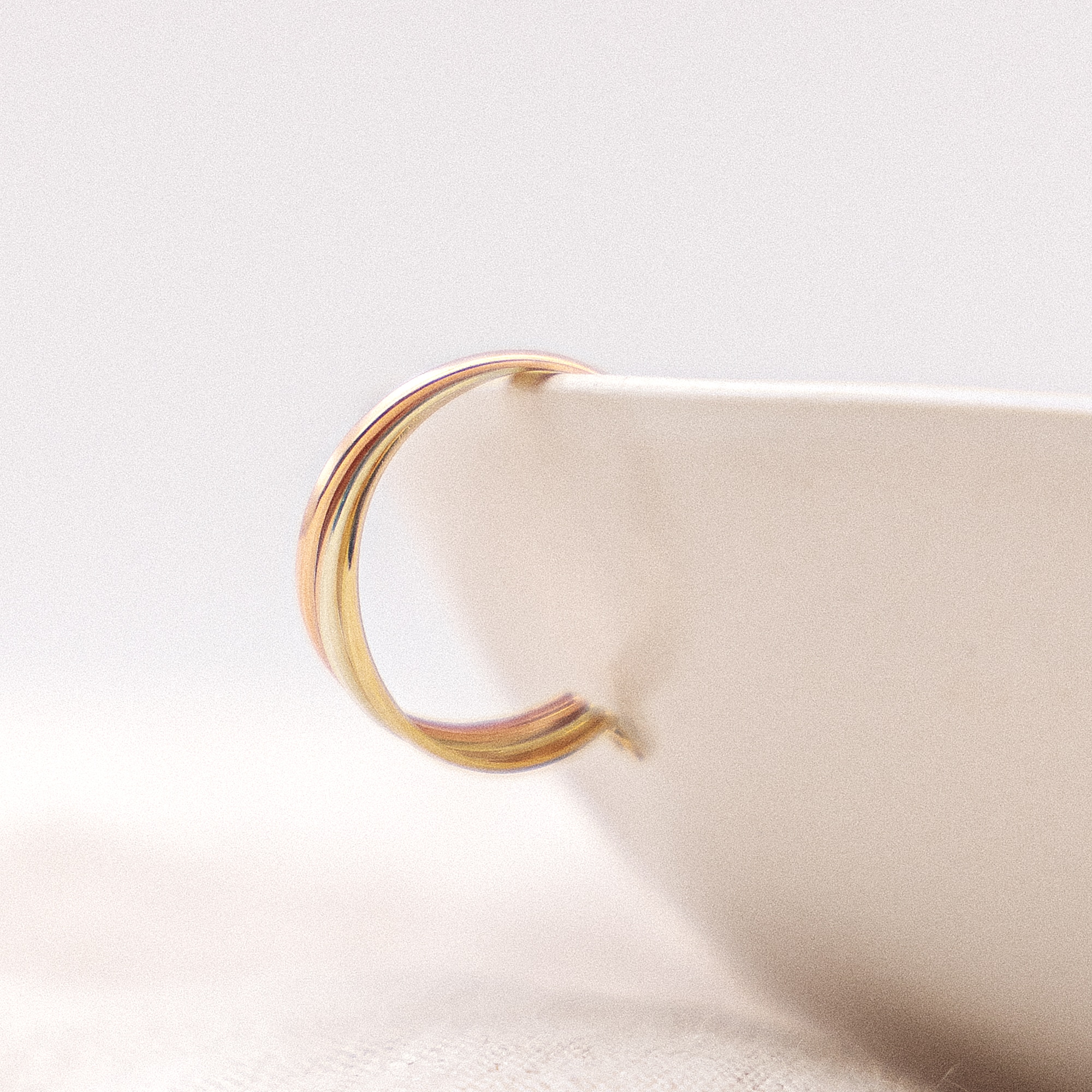 Fascination by Ellen K. Paar Creolen »Gold 333 dreifarbig«