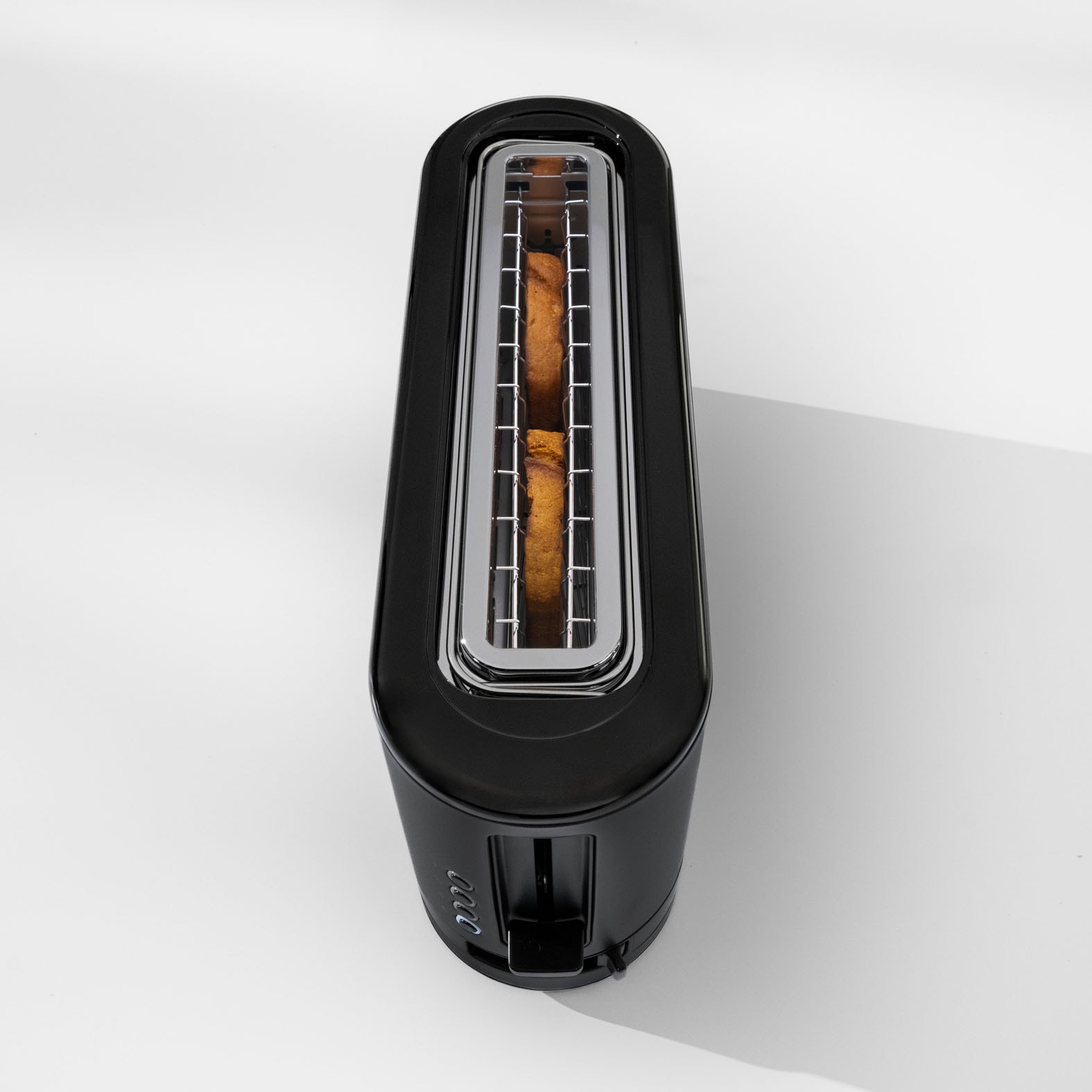 WMF Toaster »KÜCHENminis Deep Black, Lanschlitztoaster, mit Brötchenaufsatz« 1 langer Schlitz für 2 XXL-Toastscheiben 900 W 7 variable Bräunungsstufen, Brotzentrierung, Krümelschublade