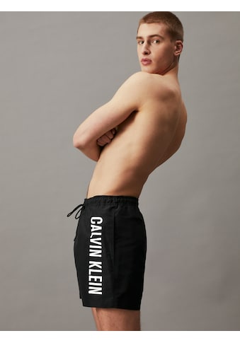 Badeshorts »MEDIUM DRAWSTRING«, mit kontrastfarbenem Logo-Schrifztug am Bein