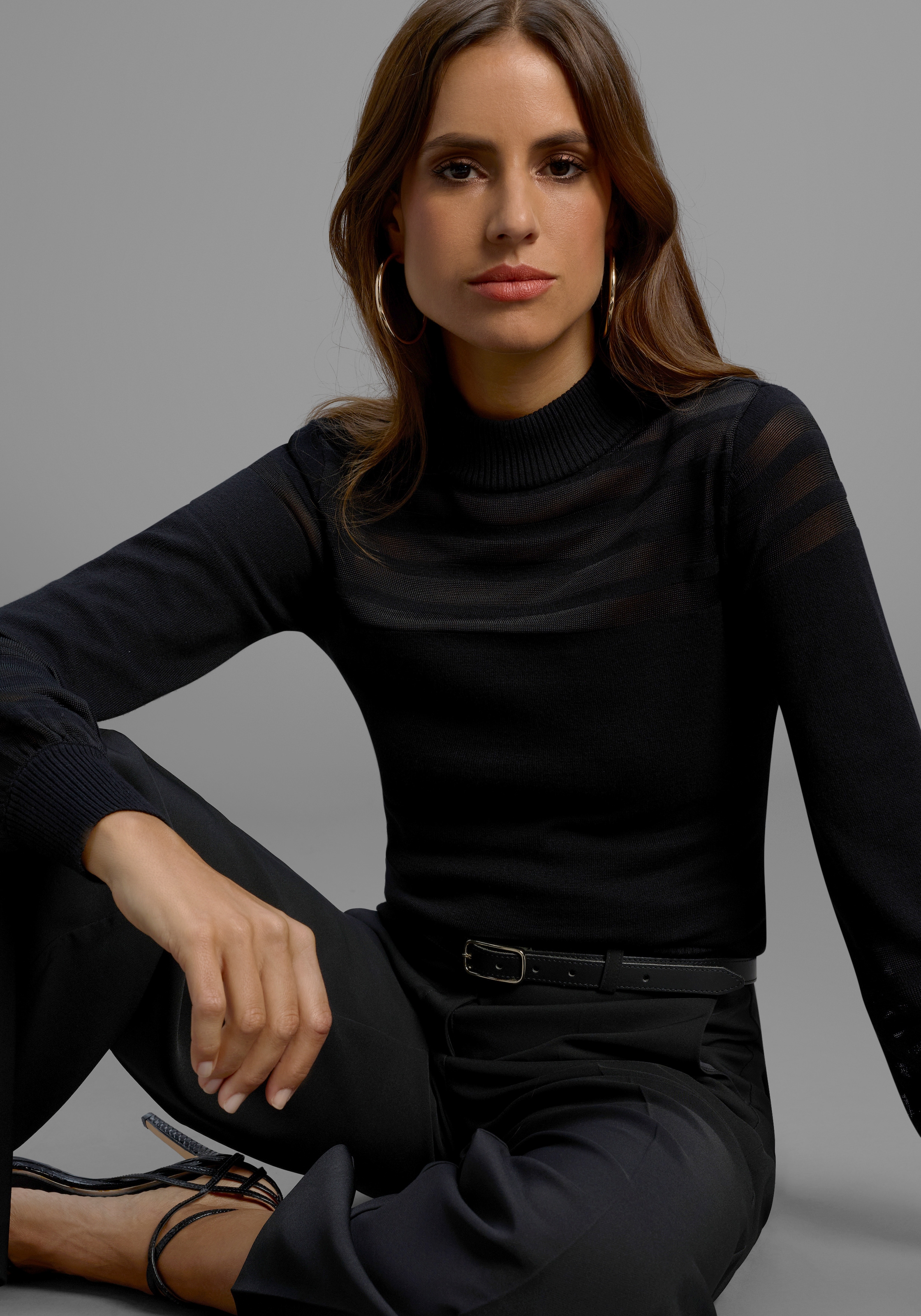 Melrose Stehkragenpullover mit transparenten Streifen und Ballonärmeln